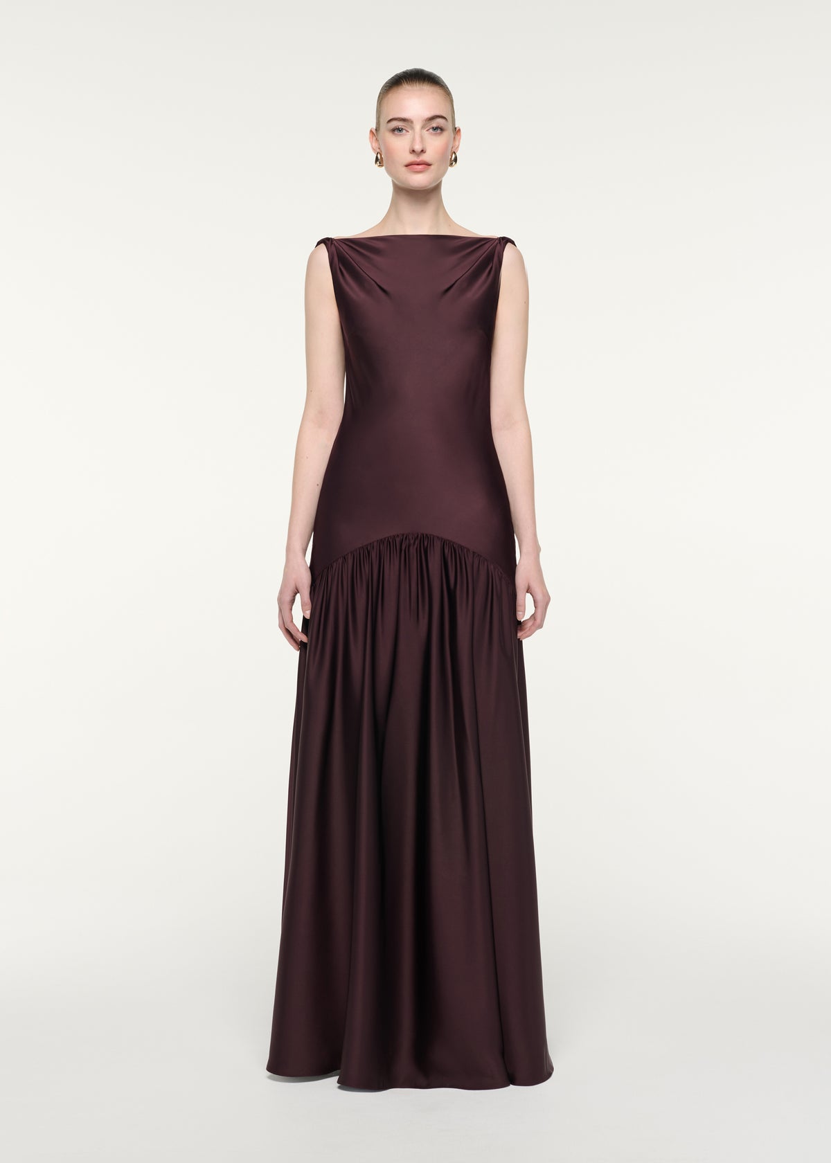 Front view of a model wearing the Twisted Strap Gown