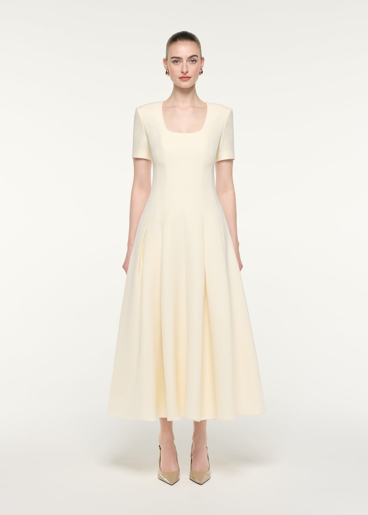 Front view of a model wearing the Scooped Neckline Wool Silk Midi Dress