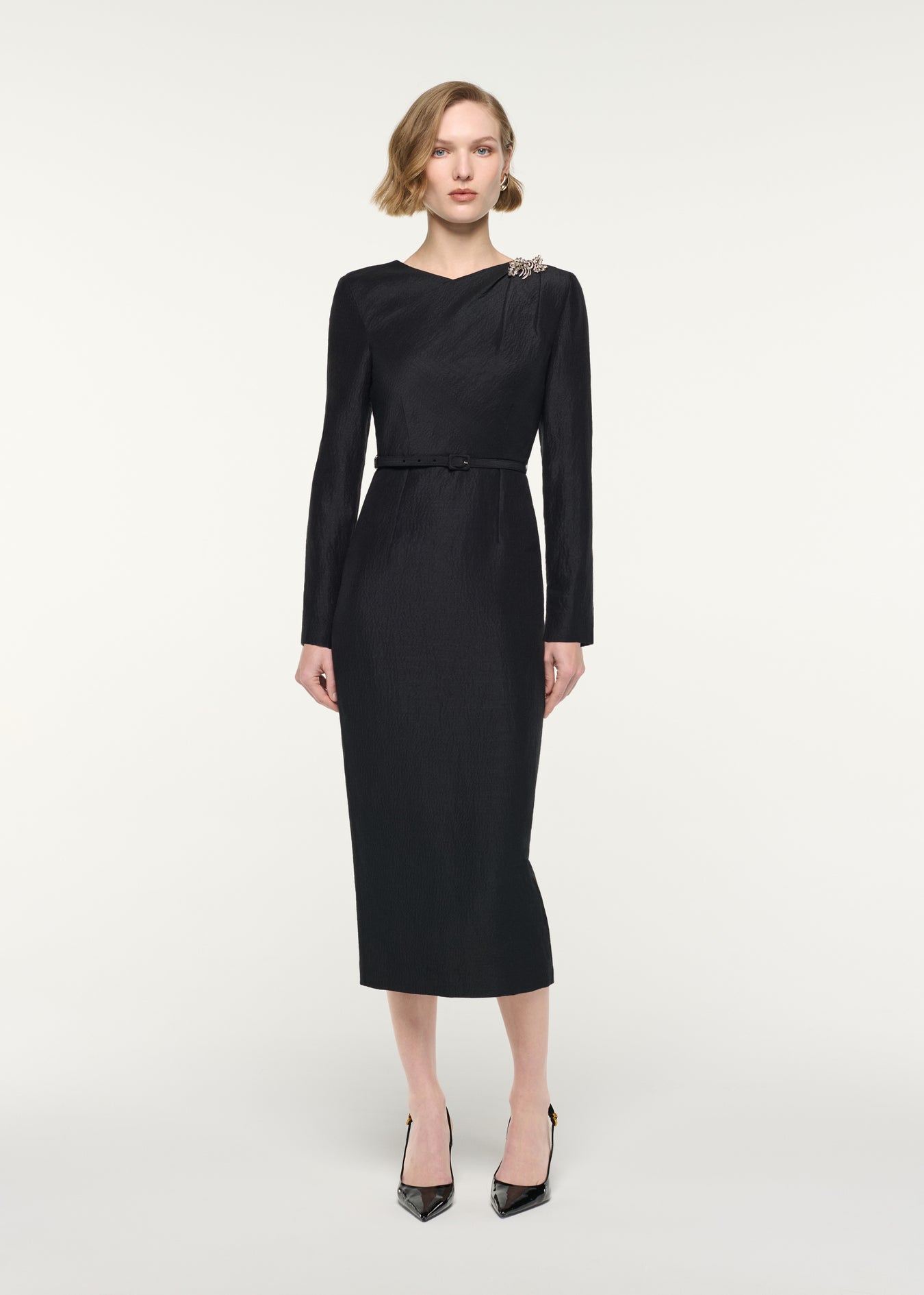 Front view of a model wearing the Brooched Silk Jacquard Midi Dress