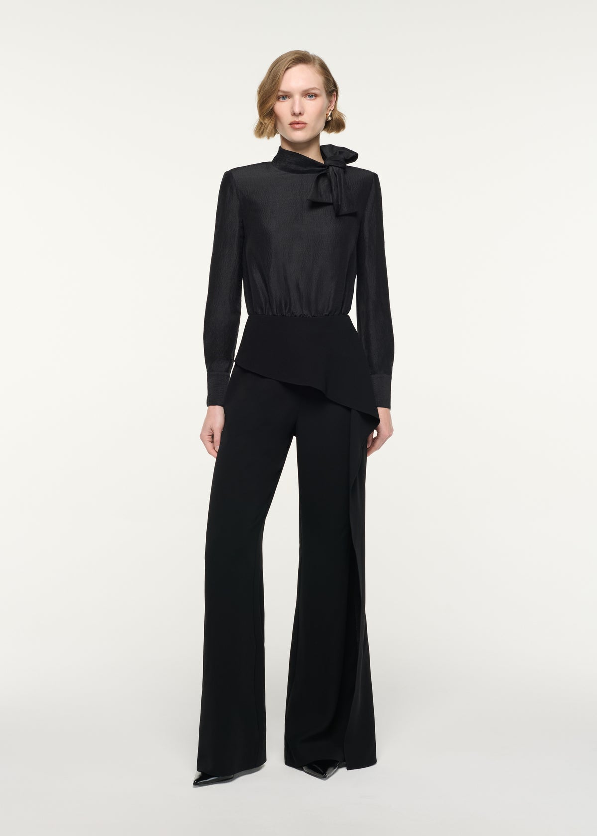Front view of a model wearing the Bow Neckline Silk Jacquard Bodysuit