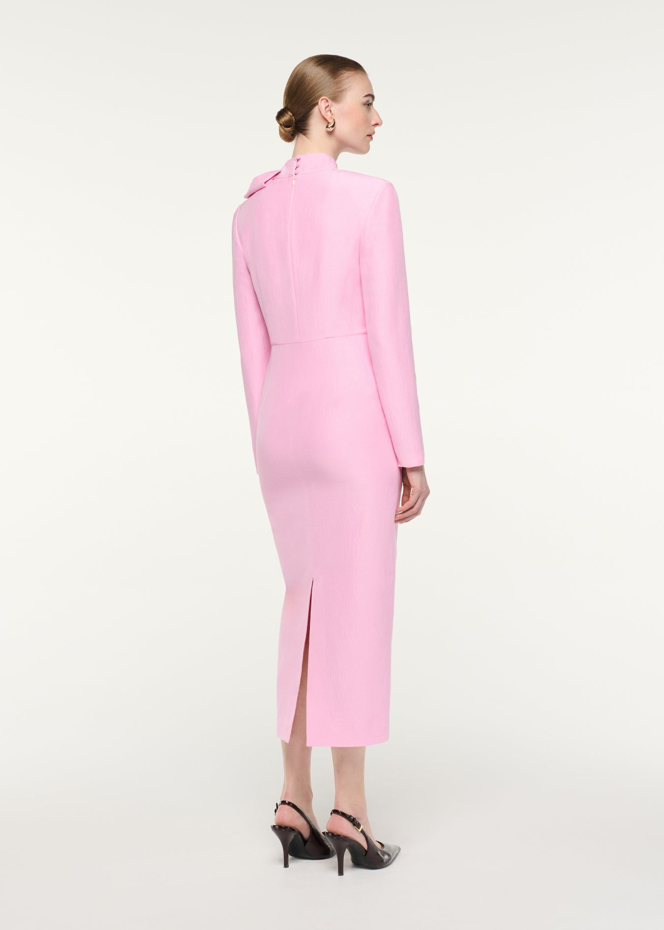 Back view of a model wearing the Bow Neckline Long Sleeve Midi Dress