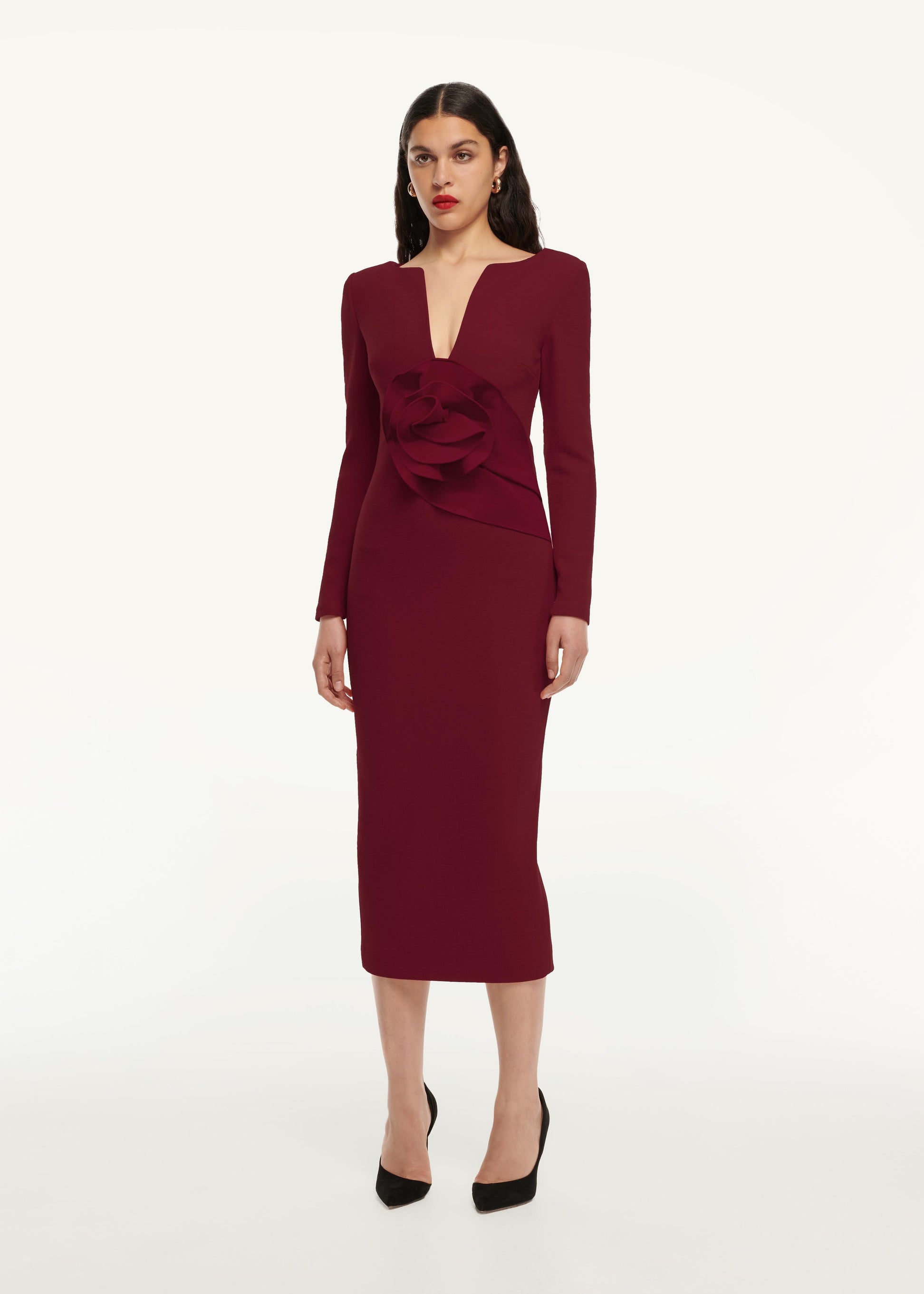 A side view image of a model wearing the Flower Detail Midi Dress in Maroon