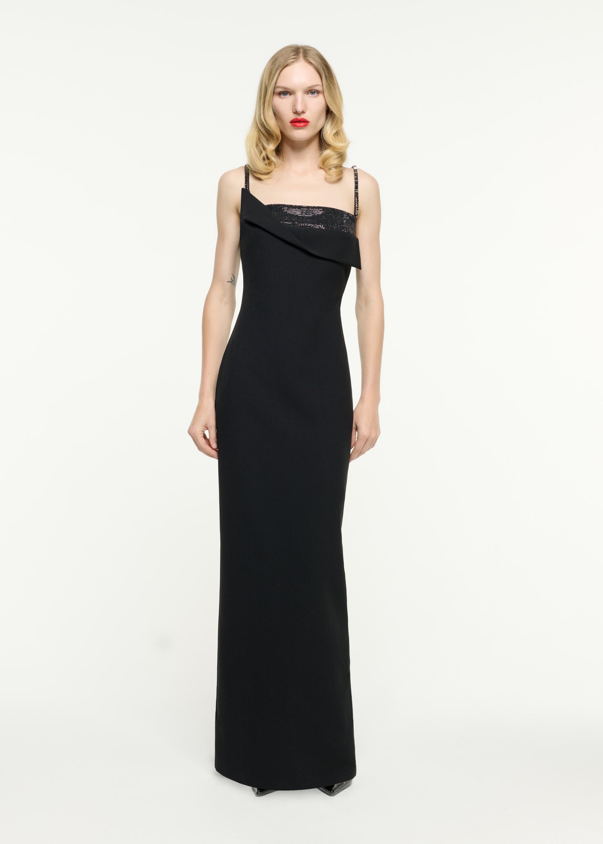 Front view of a model wearing the Embellished Crepe Gown in Black
