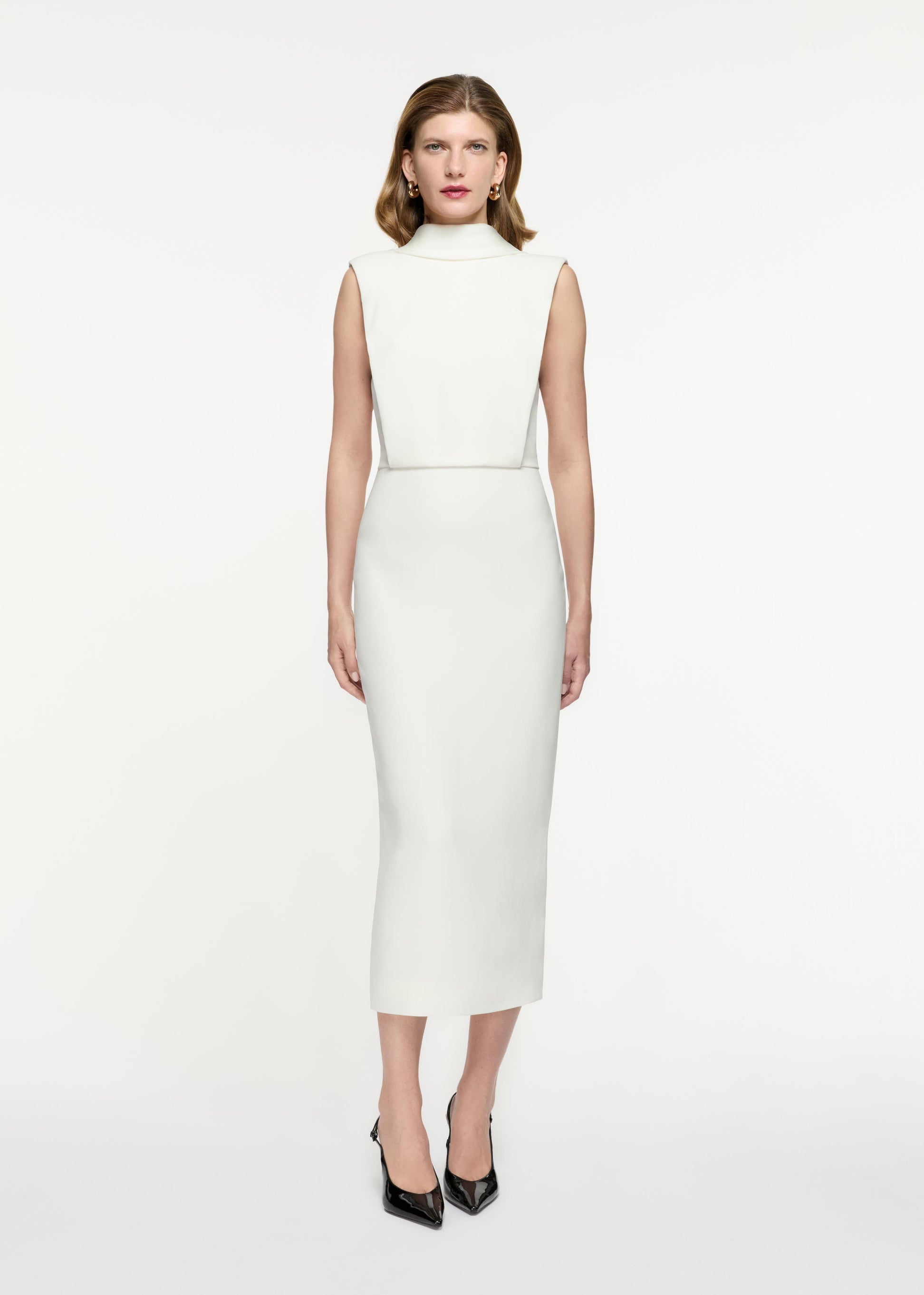 Front view of a model wearing the Stretch Cady Midi Dress in White
