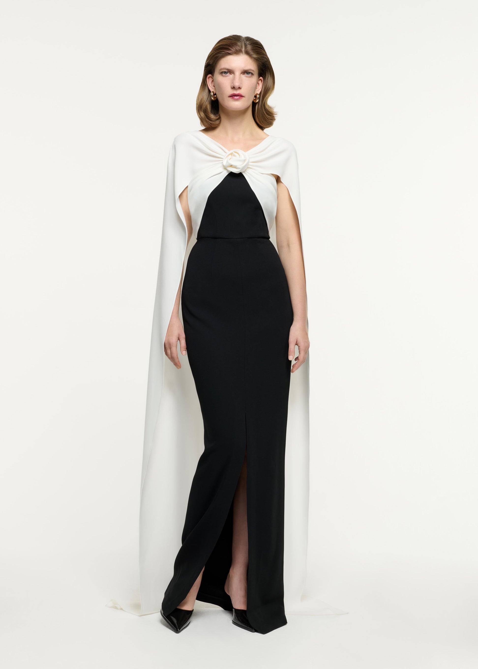 Front view of a model wearing the Cape Flower Cady Gown in Monochrome