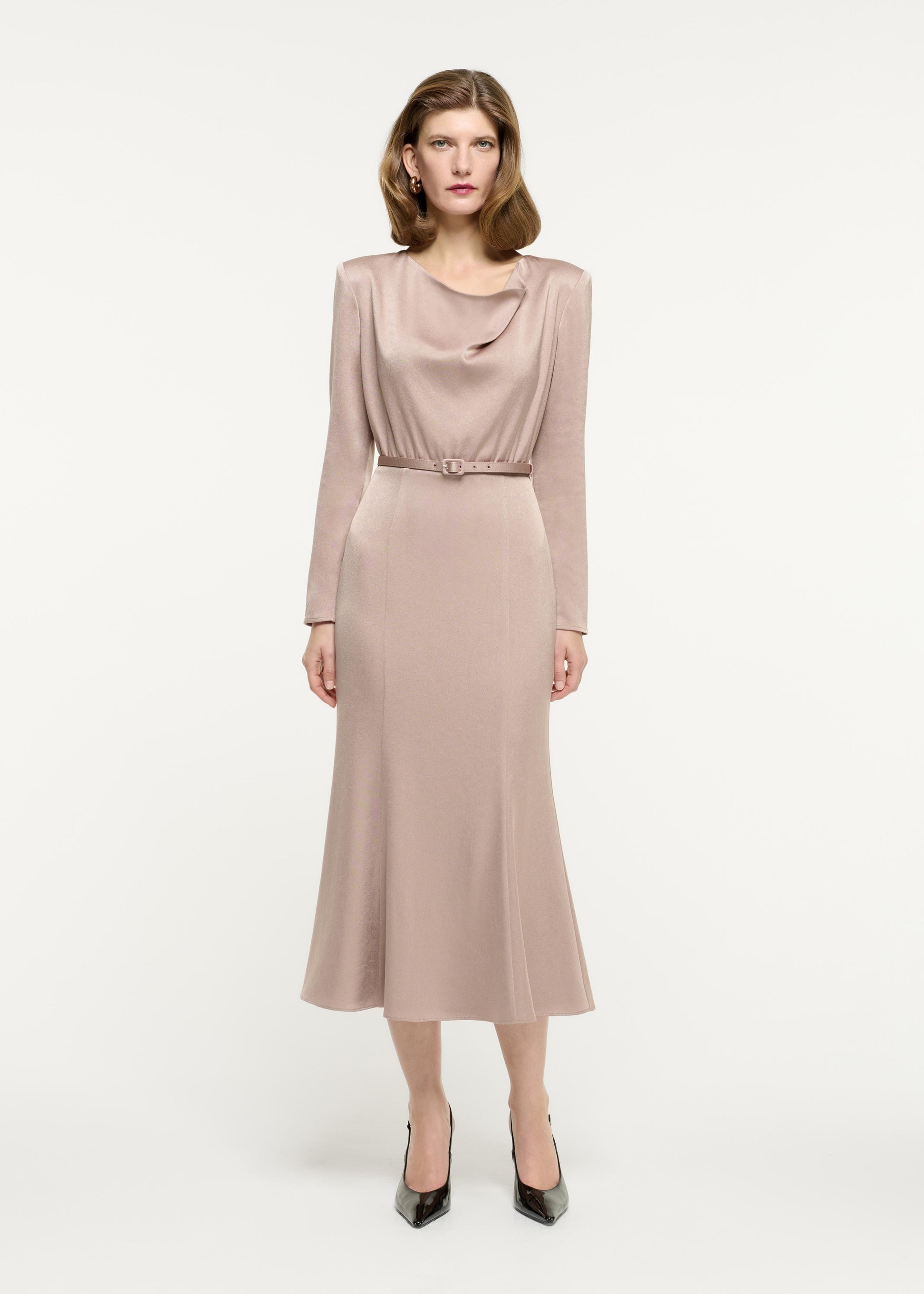 Front view of a model wearing the Cowl Drape Satin Crepe Midi Dress in Beige