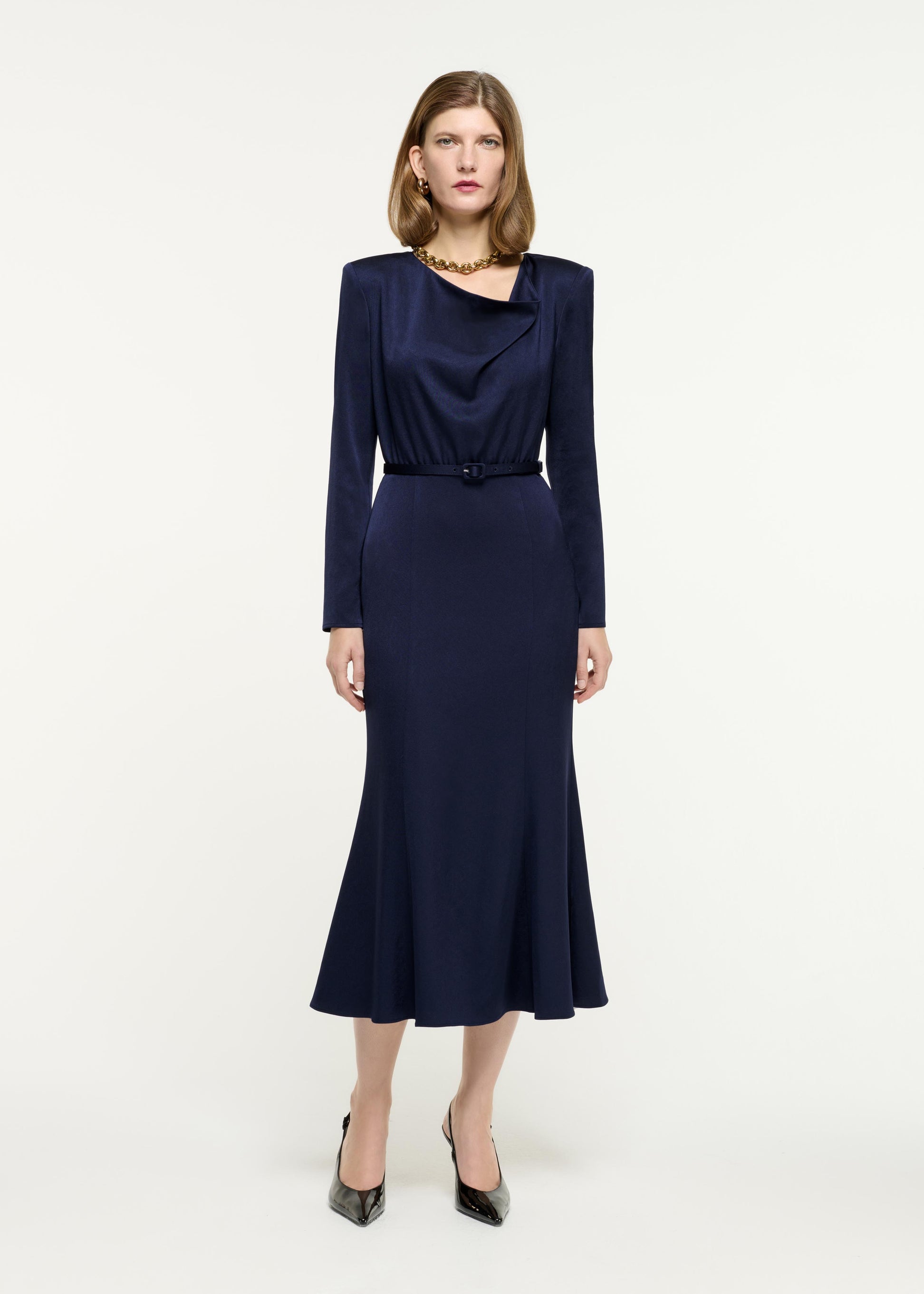 Front view of a model wearing the Cowl Drape Satin Crepe Midi Dress in Navy