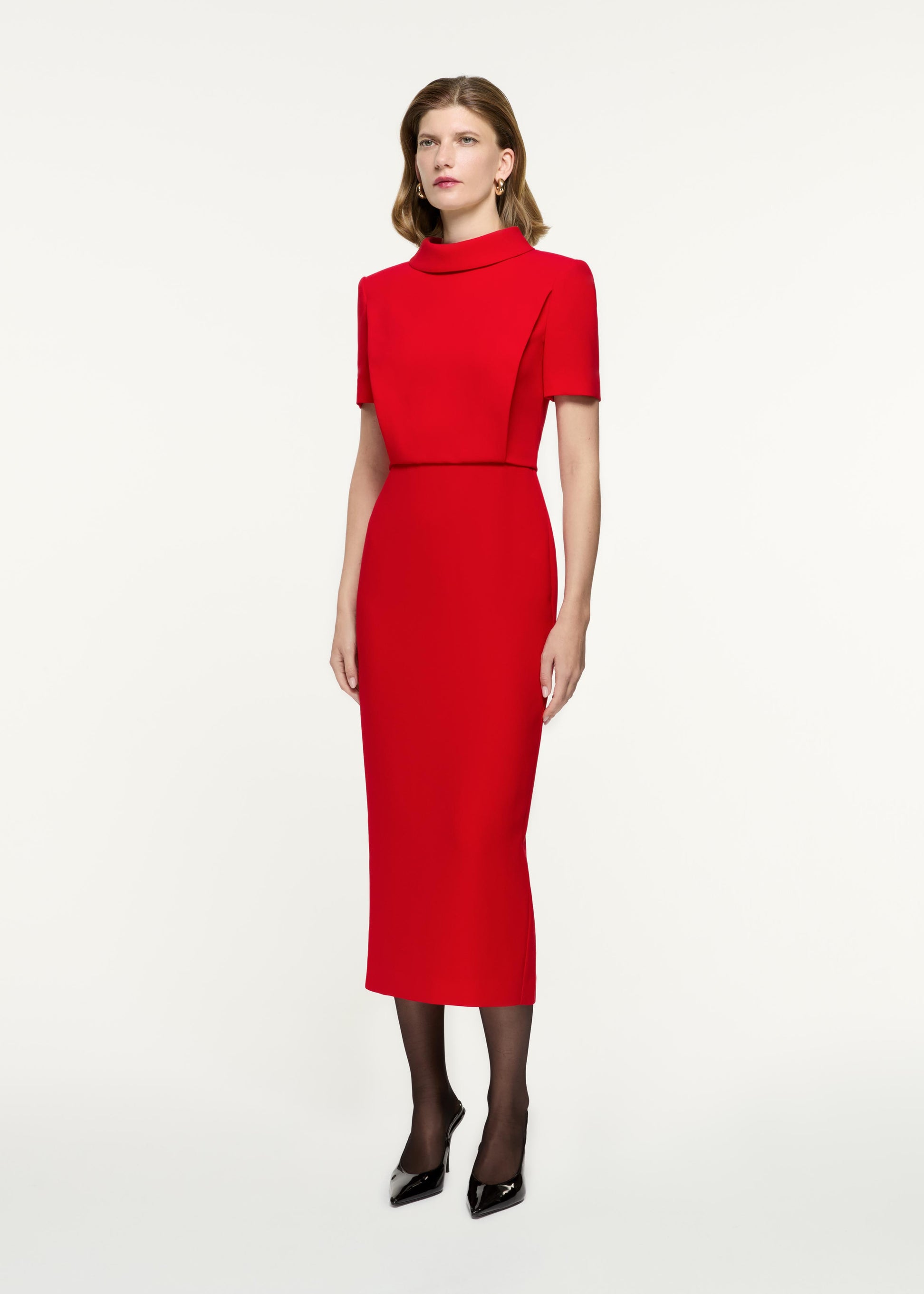 Side view of a model wearing the Collared Midi Dress in Red