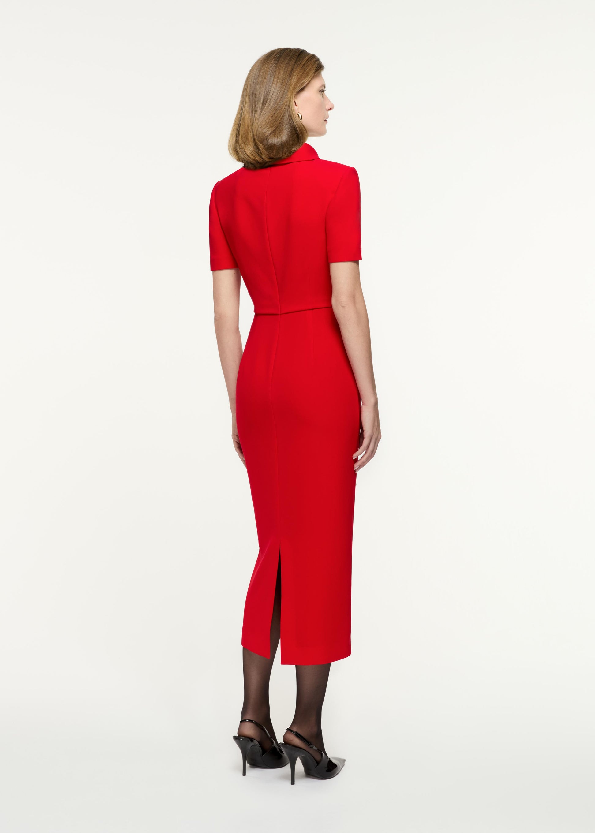 Back view of a model wearing the Collared Midi Dress in Red