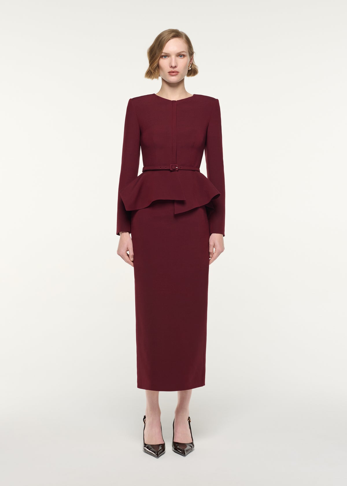 Front view of a model wearing the Wool Silk Midi Skirt