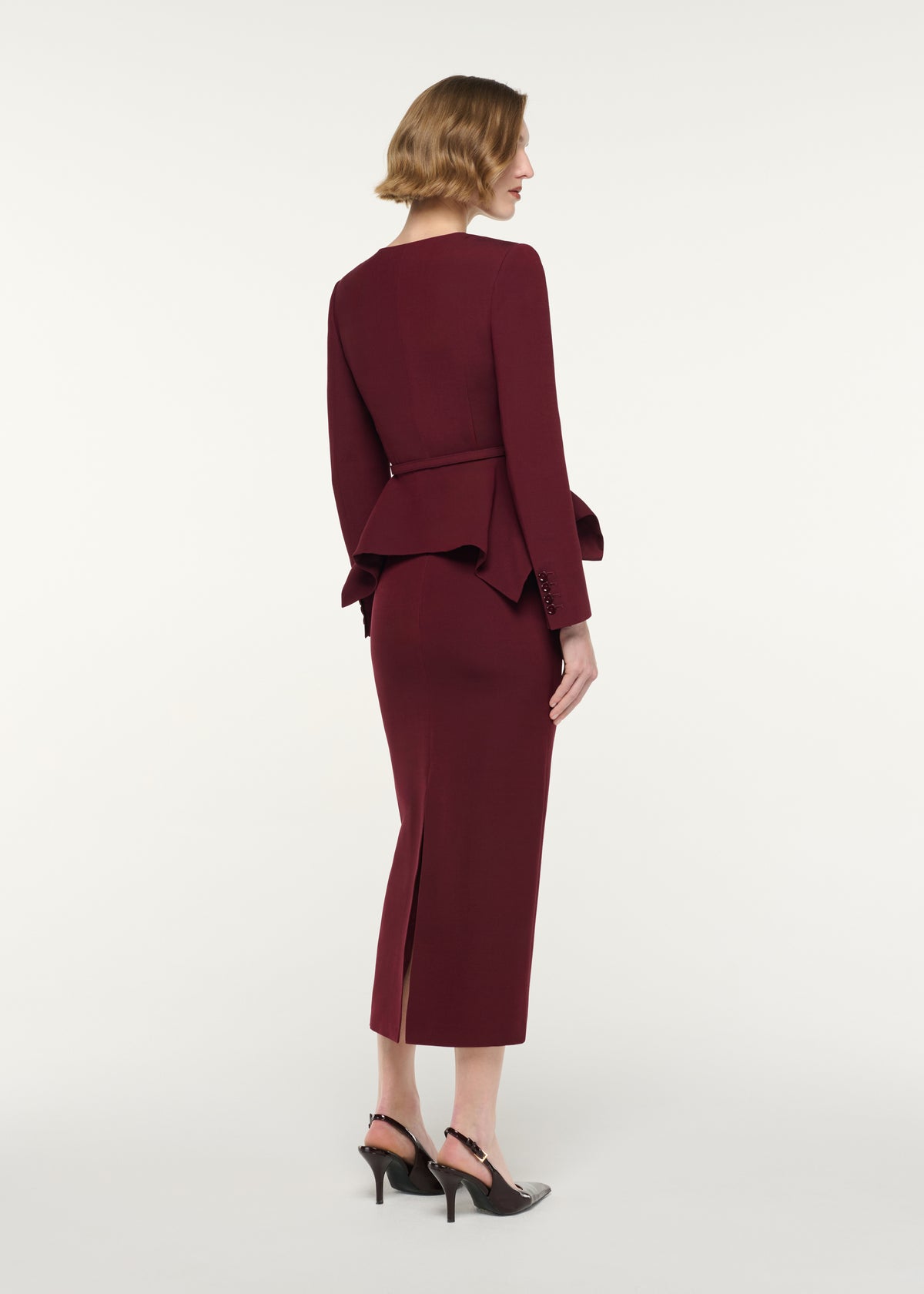 Back view of a model wearing the Wool Silk Midi Skirt