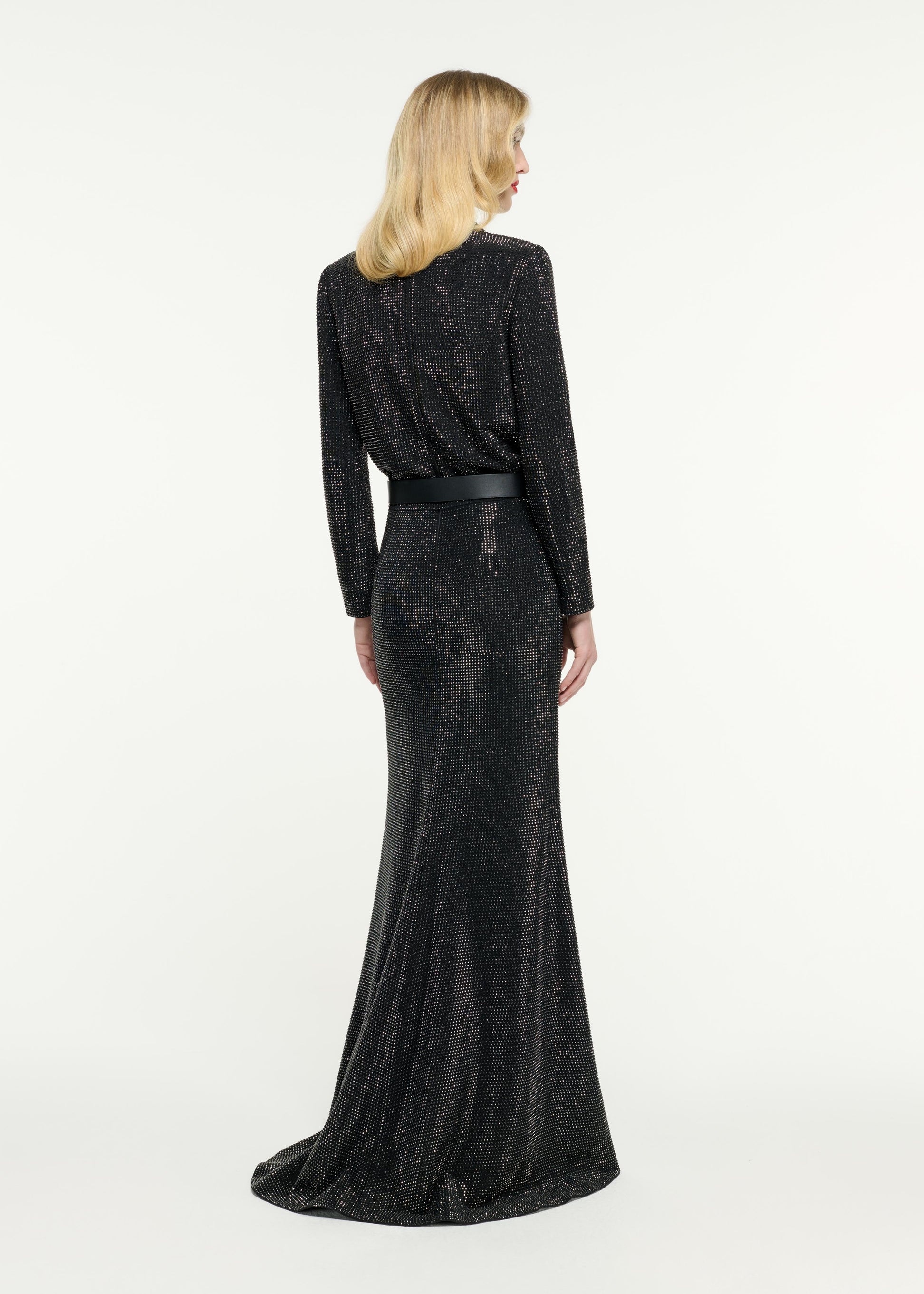 Back view of a model wearing the Diamante Maxi Skirt in Black