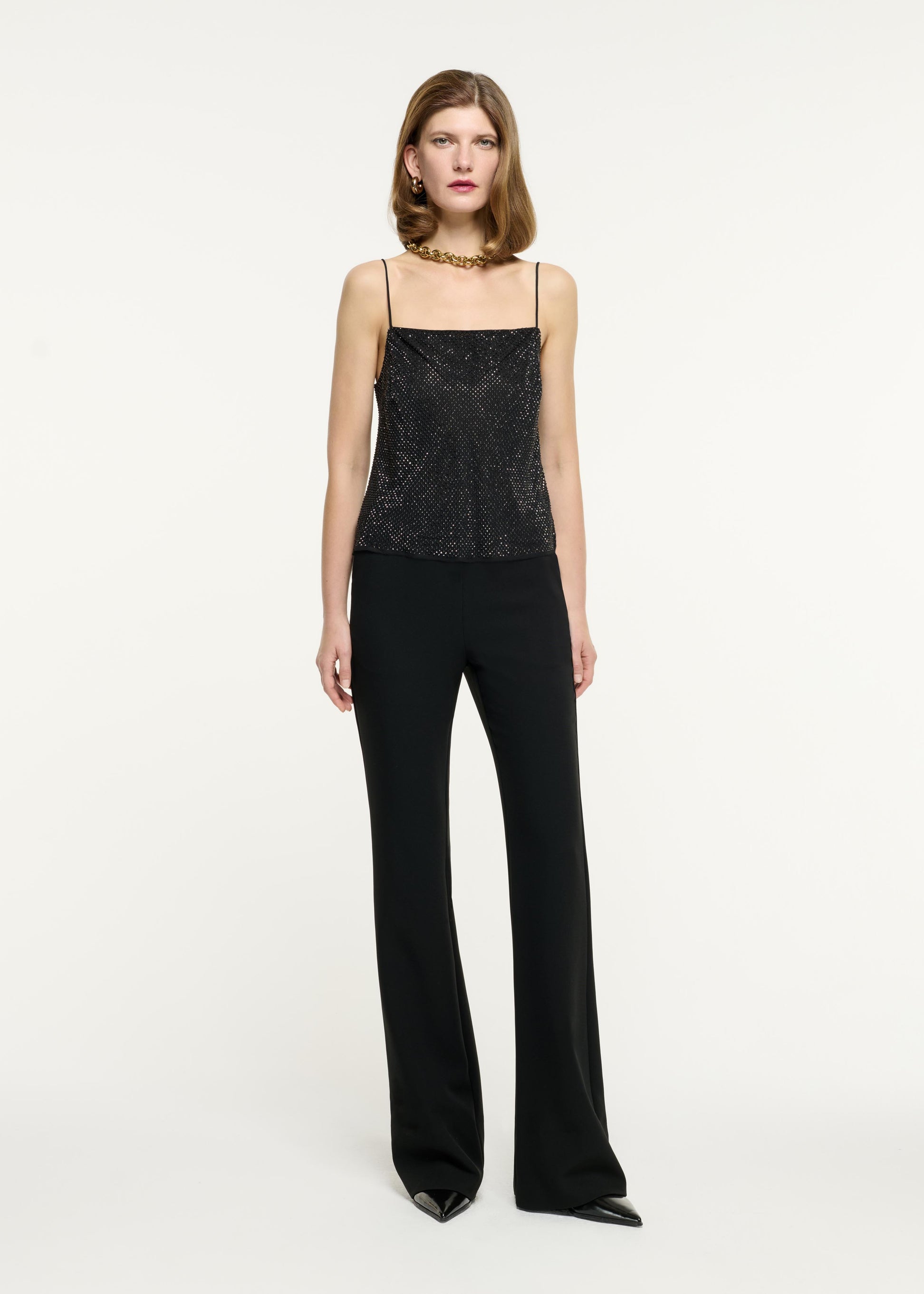 Front view of a model wearing the Diamante Chiffon Top in Black