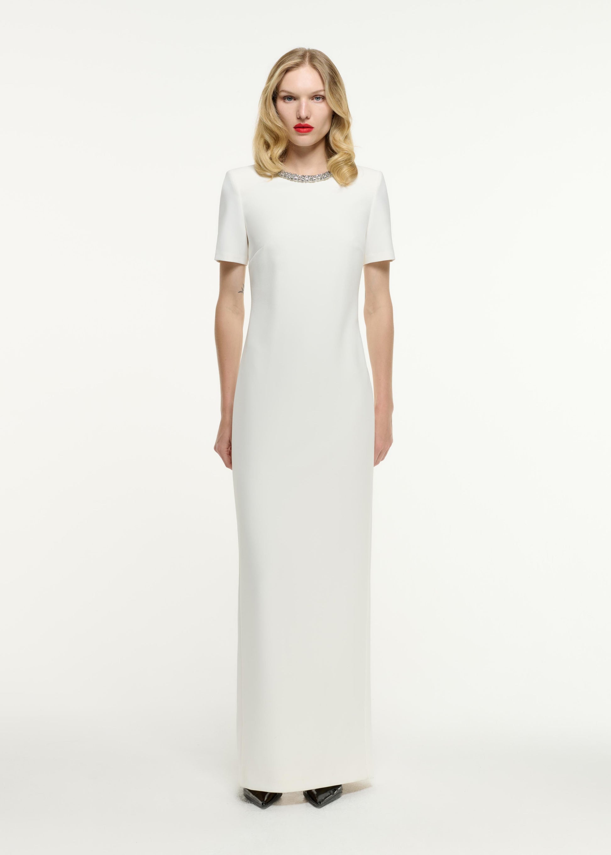 Front view of a model wearing the Short Sleeve Embellished Crepe Maxi Dress in Cream