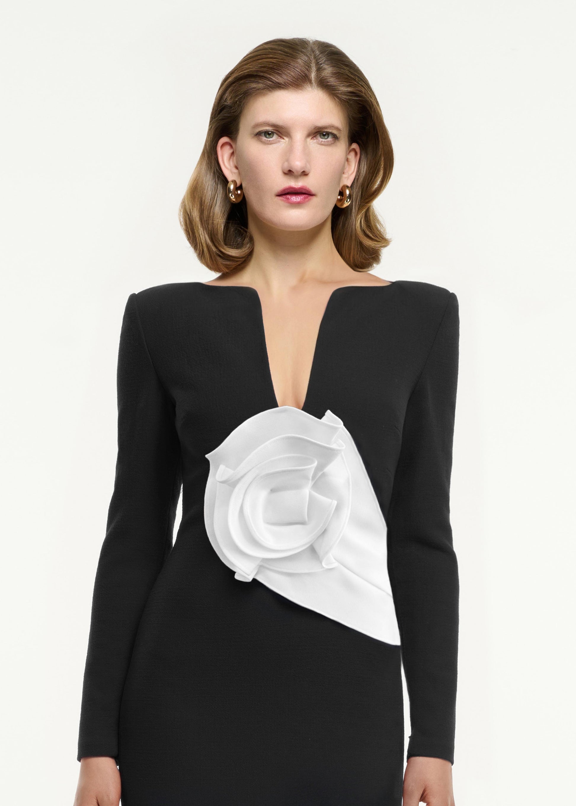 Back view of a model wearing the Flower Detail Maxi Dress in Monochrome