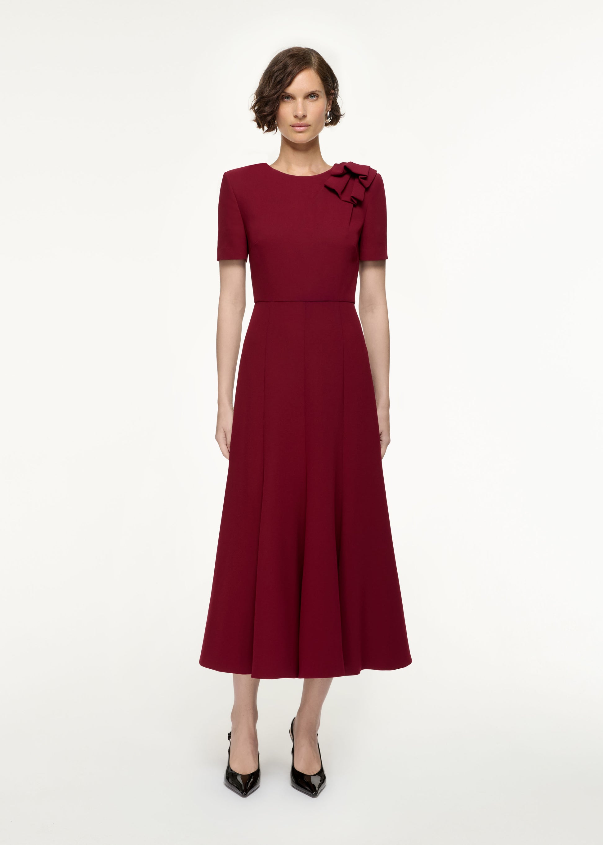 Front view of a model wearing the Short Sleeve Heavy Cady Midi Dress in Red