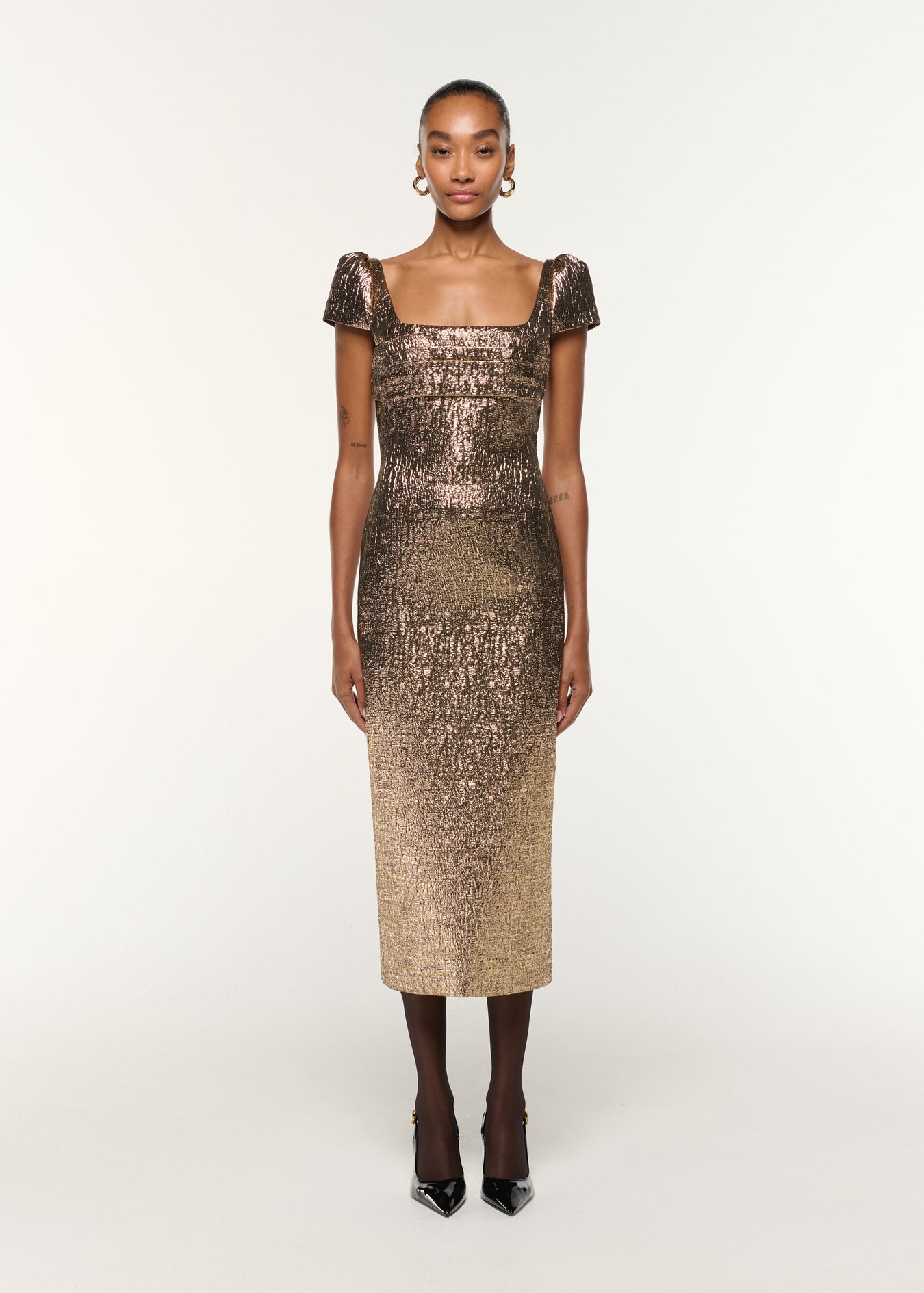 Front view of a model wearing the Pleated Drape Metallic Jacquard Dress in Gold