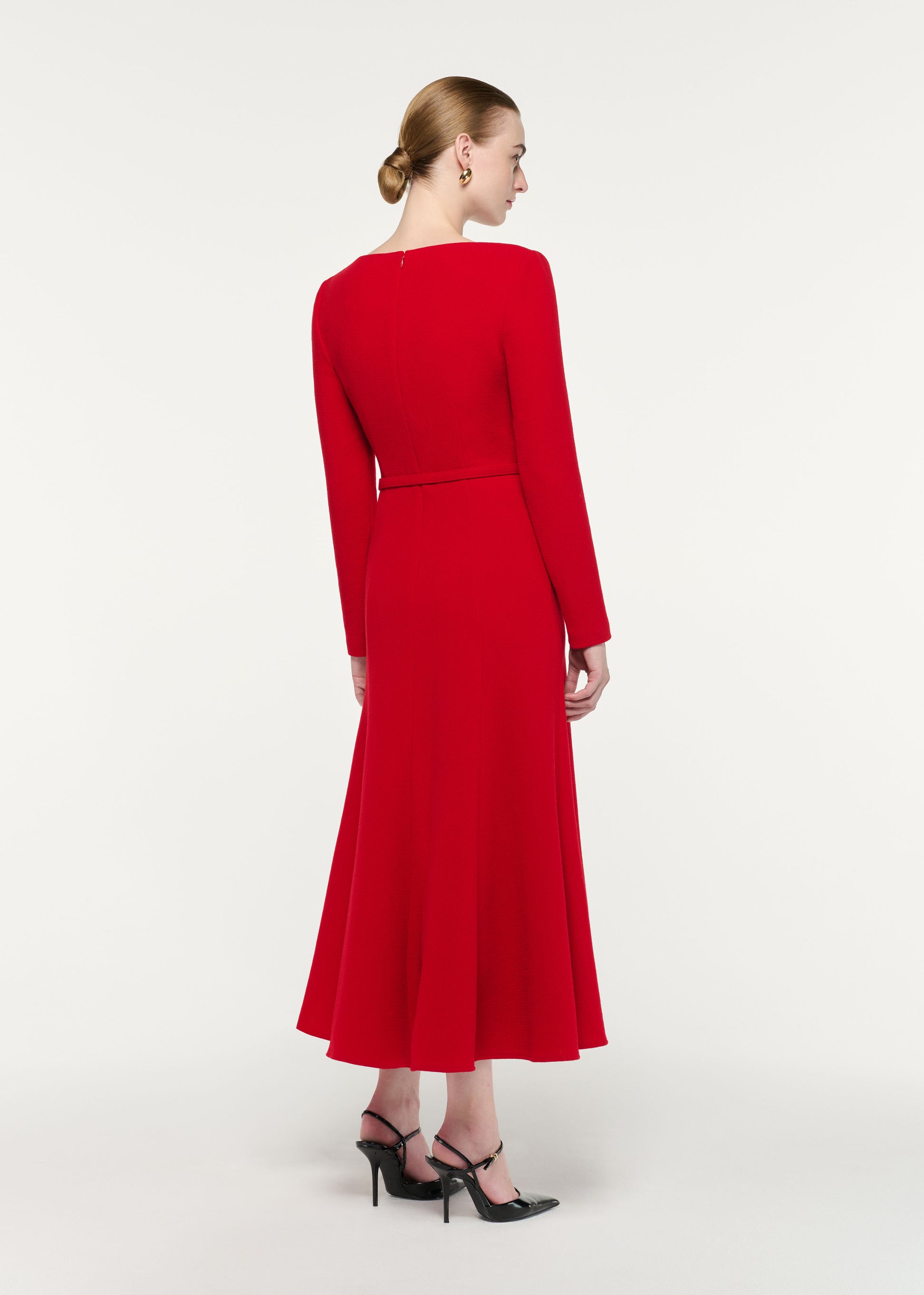 Back view of a model wearing the Boat Neck Wool Crepe Dress