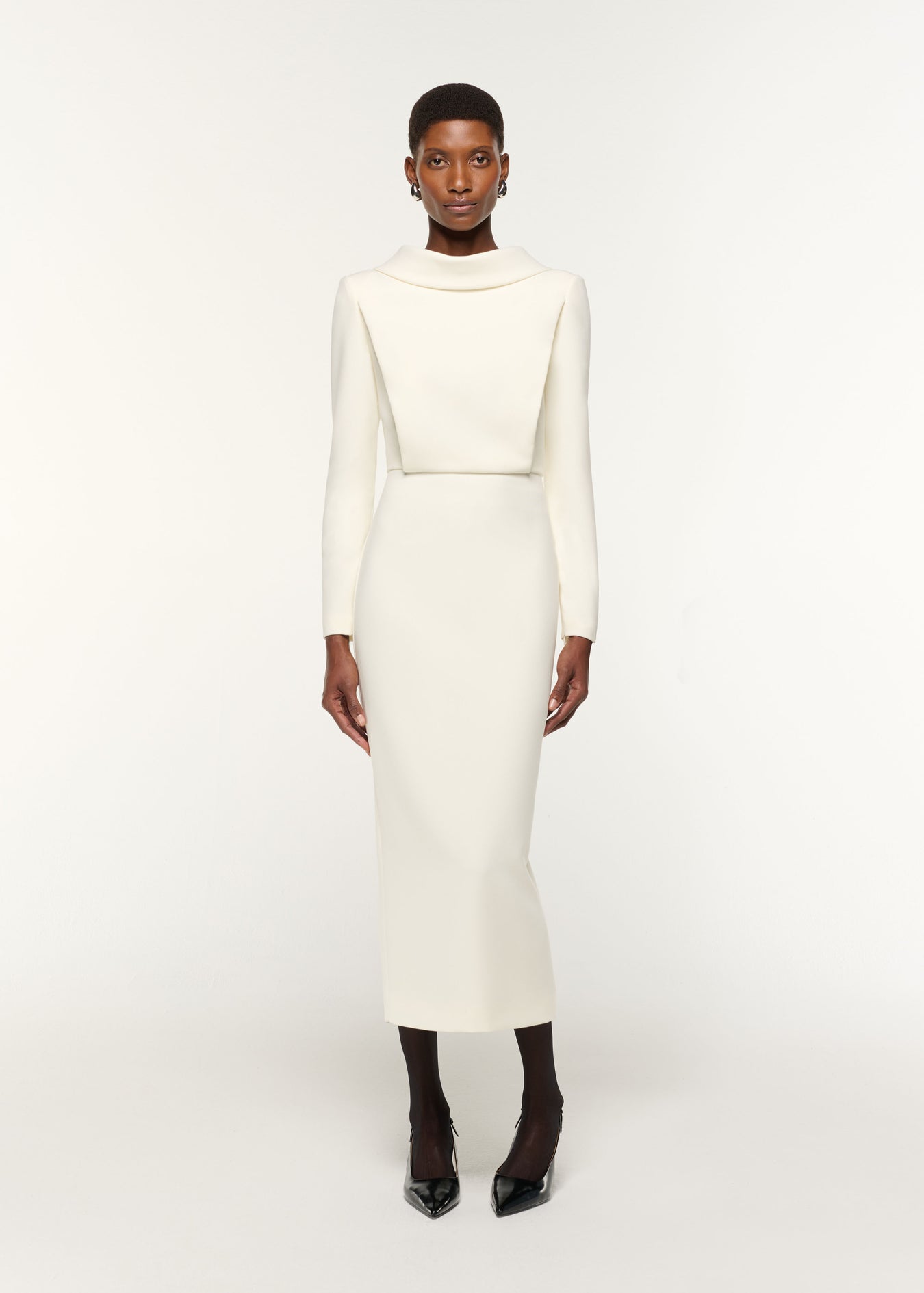 Front view of a model wearing the Collared Crepe Midi Dress in Cream