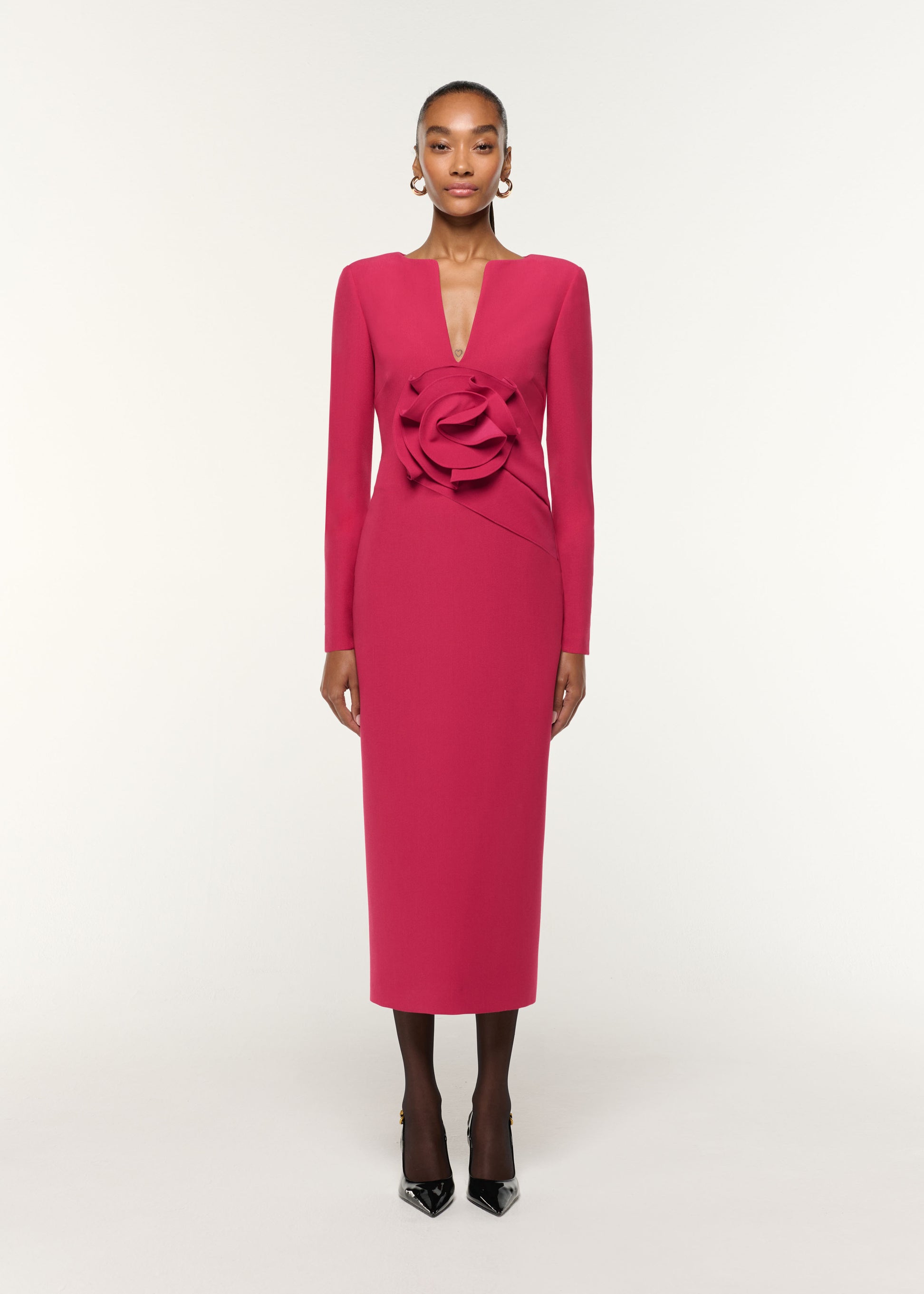 Front view of a model wearing the Flower Drape Crepe Midi Dress in Pink