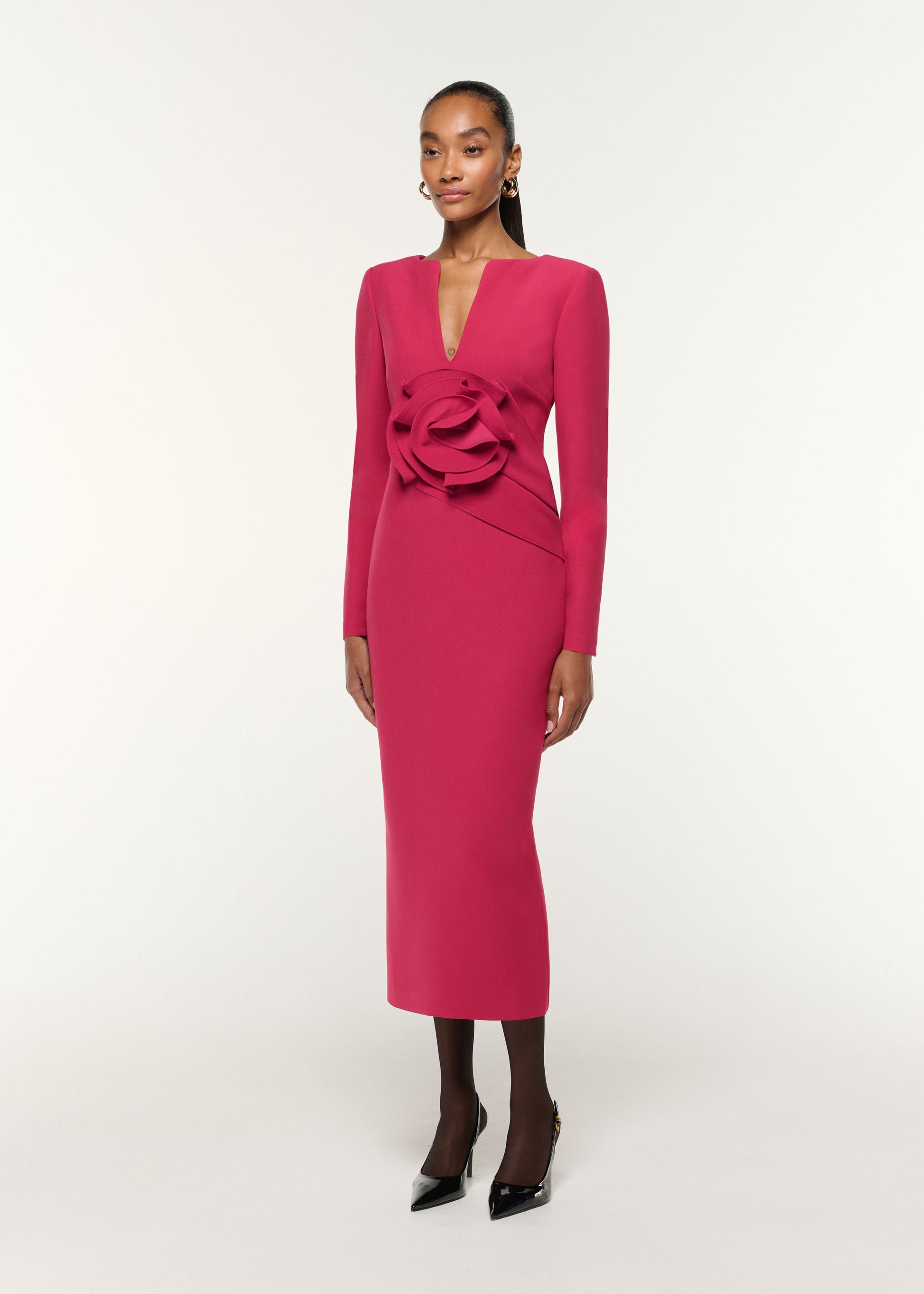Side view of a model wearing the Flower Drape Crepe Midi Dress in Pink