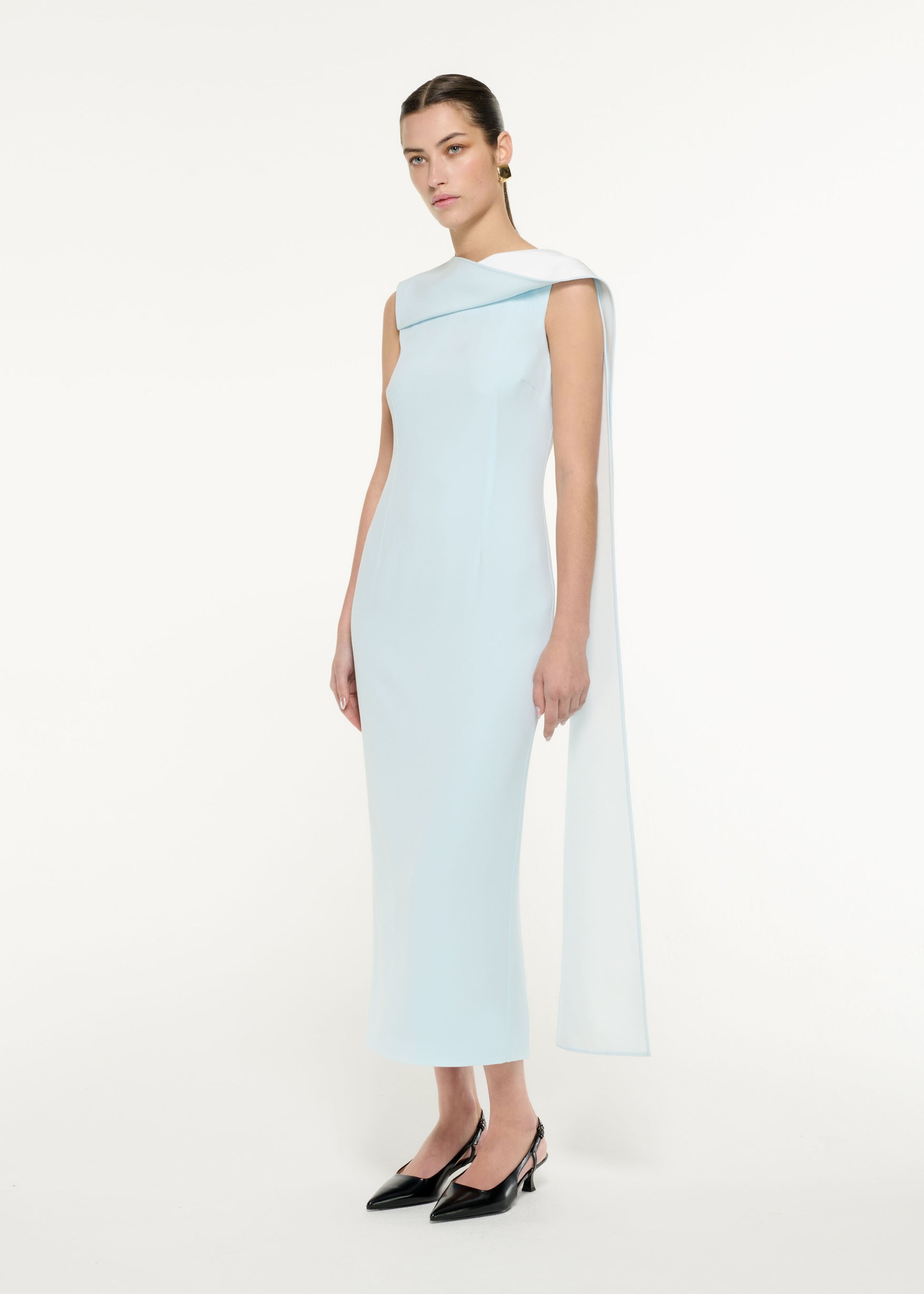 Side view of a model wearing the Satin Crepe Sash Midi Dress in Blue/White
