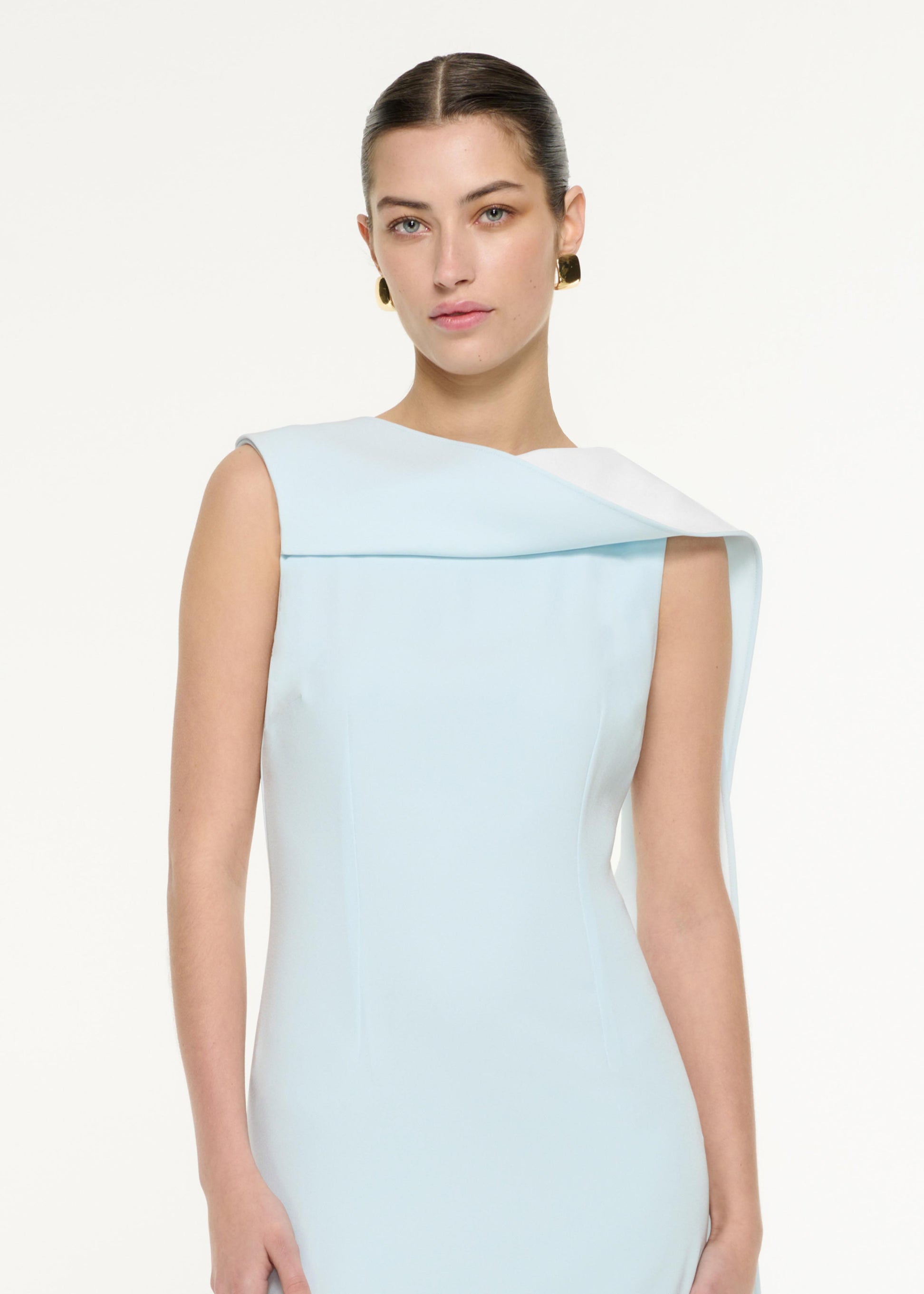 Close up of a model wearing the Satin Crepe Sash Midi Dress in Blue/White