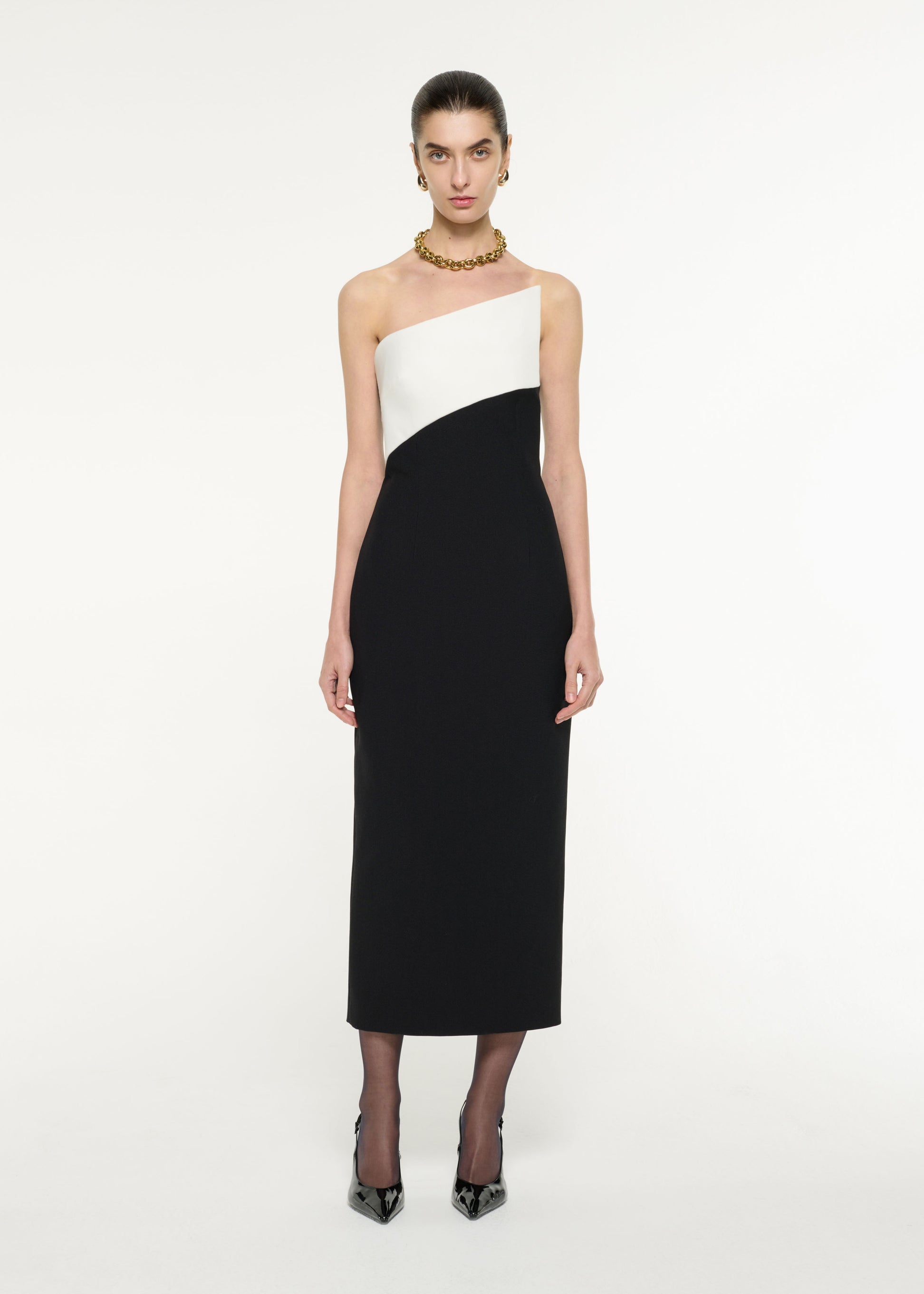 Front view of a model wearing the Contrast Panel Midi Dress in Monochrome