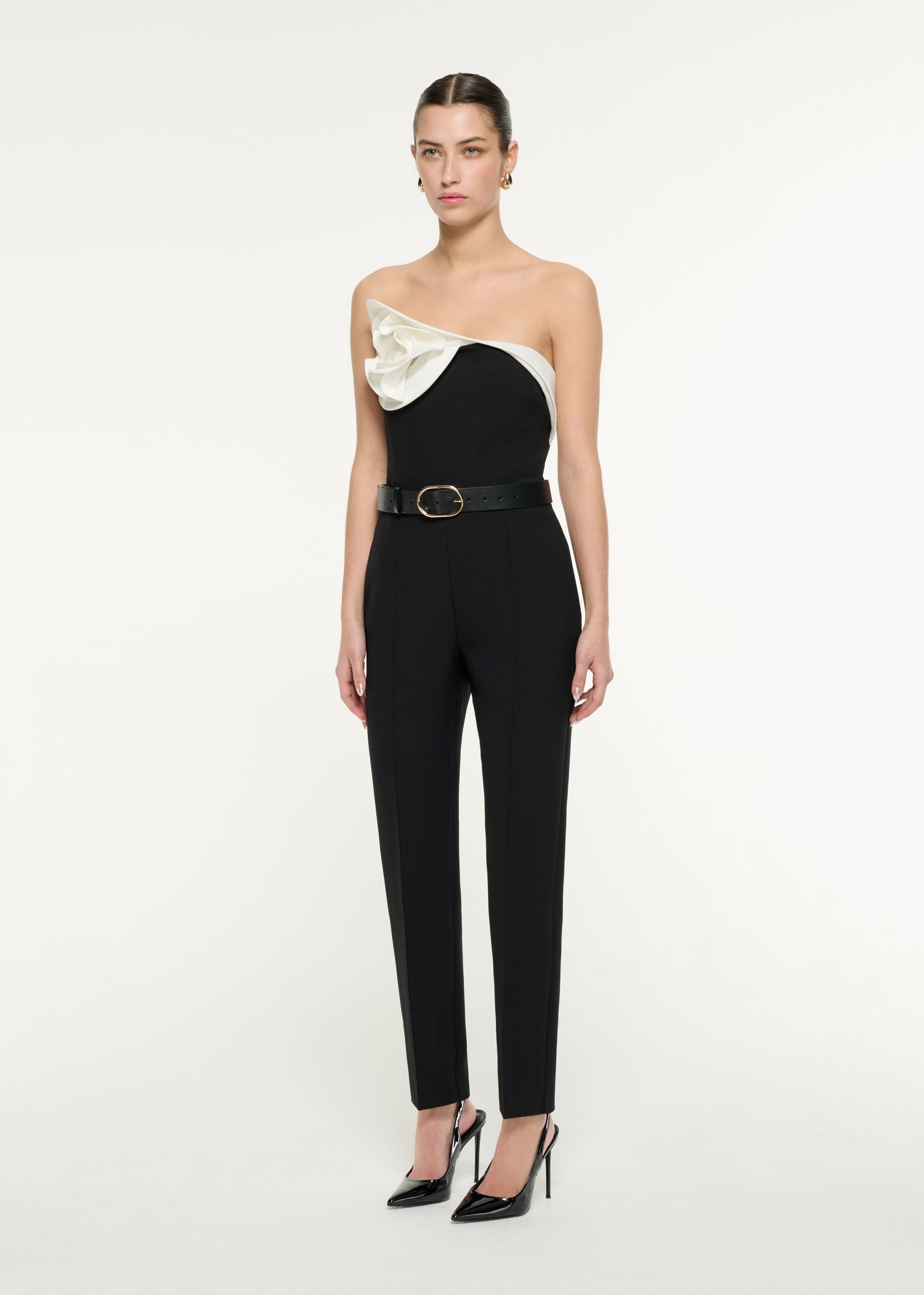 Side view of a model wearing the Flower Crepe Top in Monochrome