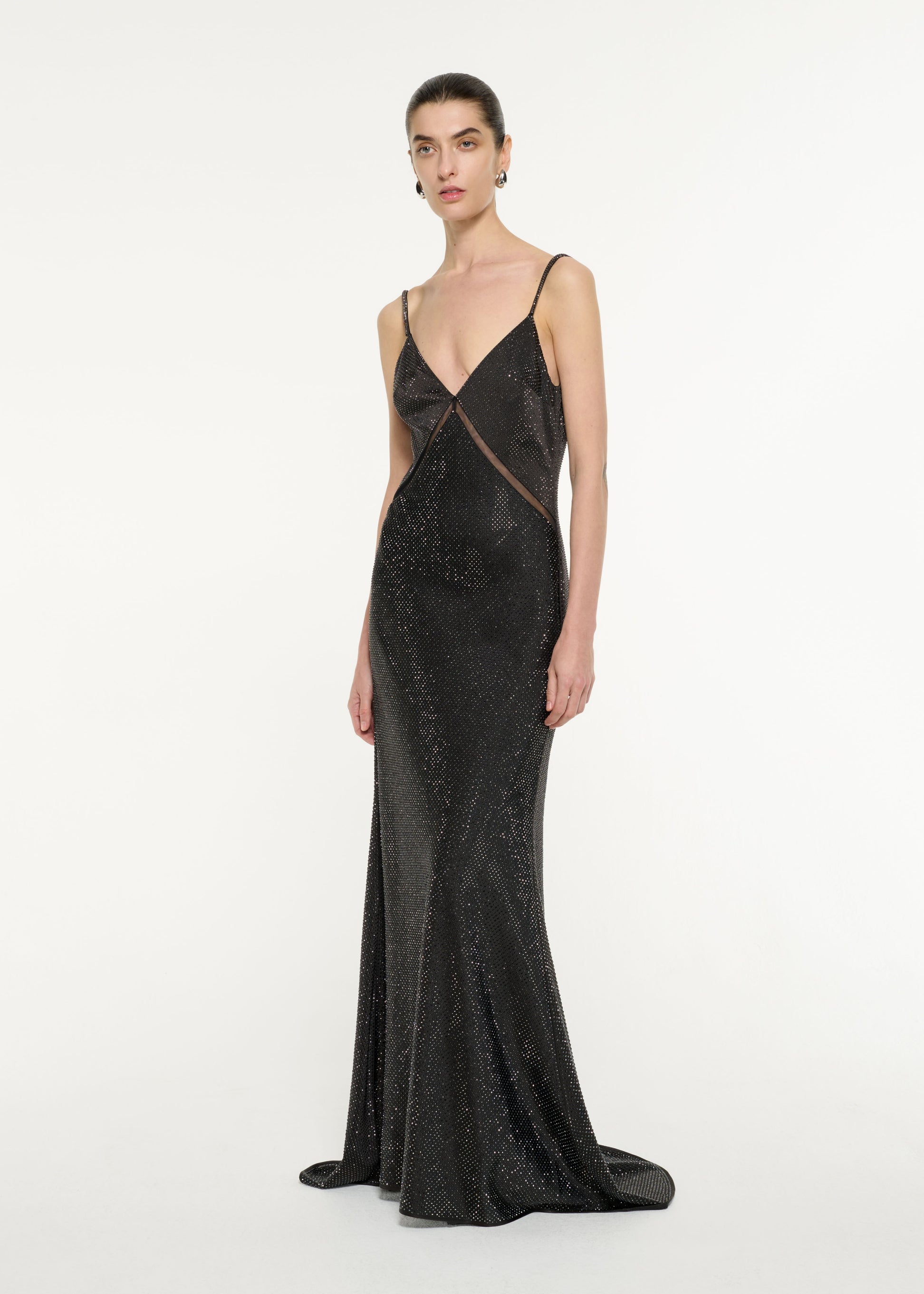 Side view of a model wearing the Satin Diamante Gown in Black