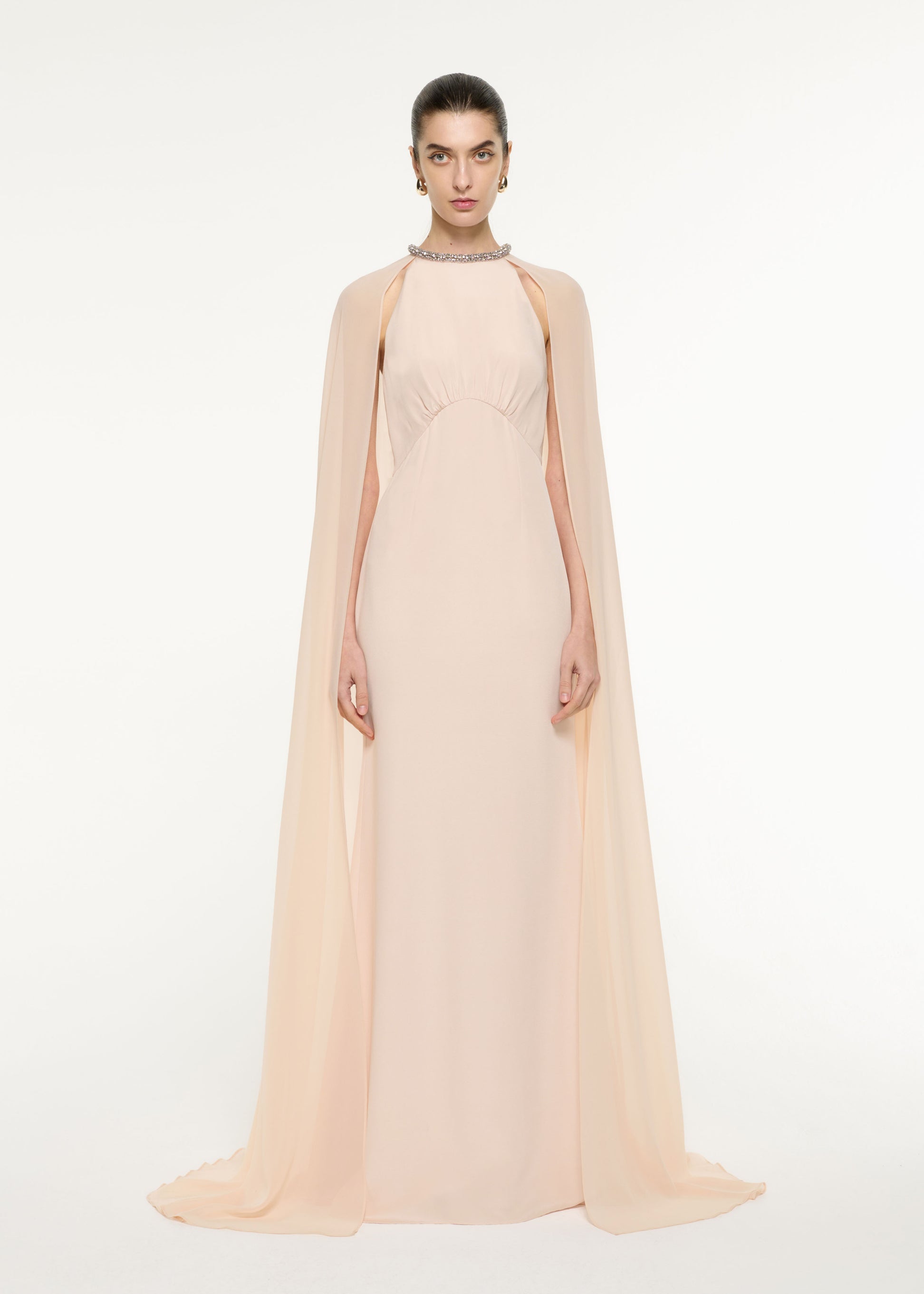 Front view of a model wearing the Silk Chiffon Cape Dress in Nude