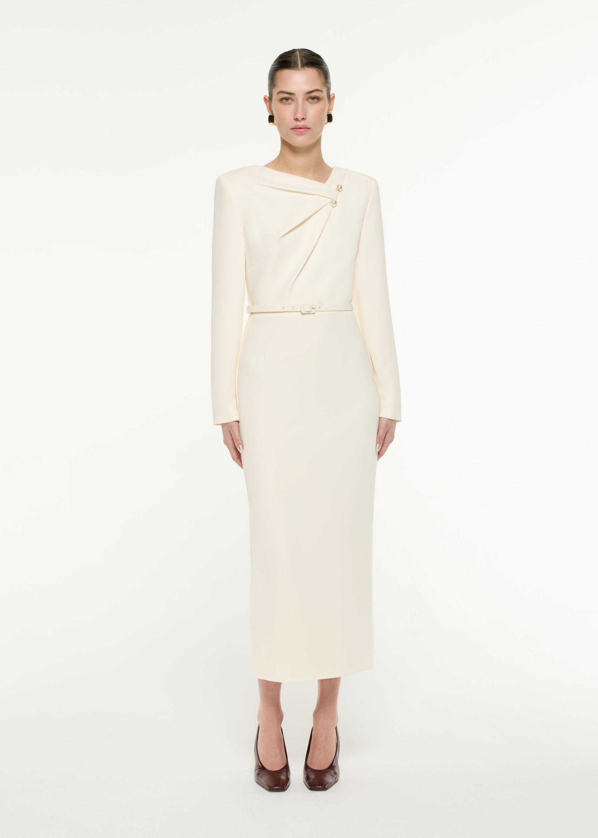 Front view of a model wearing the Tri-fold drape Midi Dress in Cream