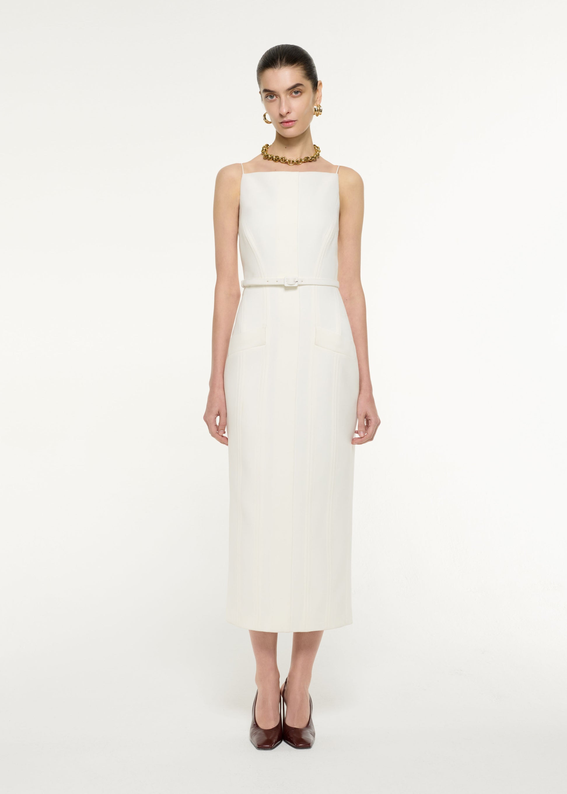 Front view of a model wearing the Crepe Tailored Midi Dress in Cream