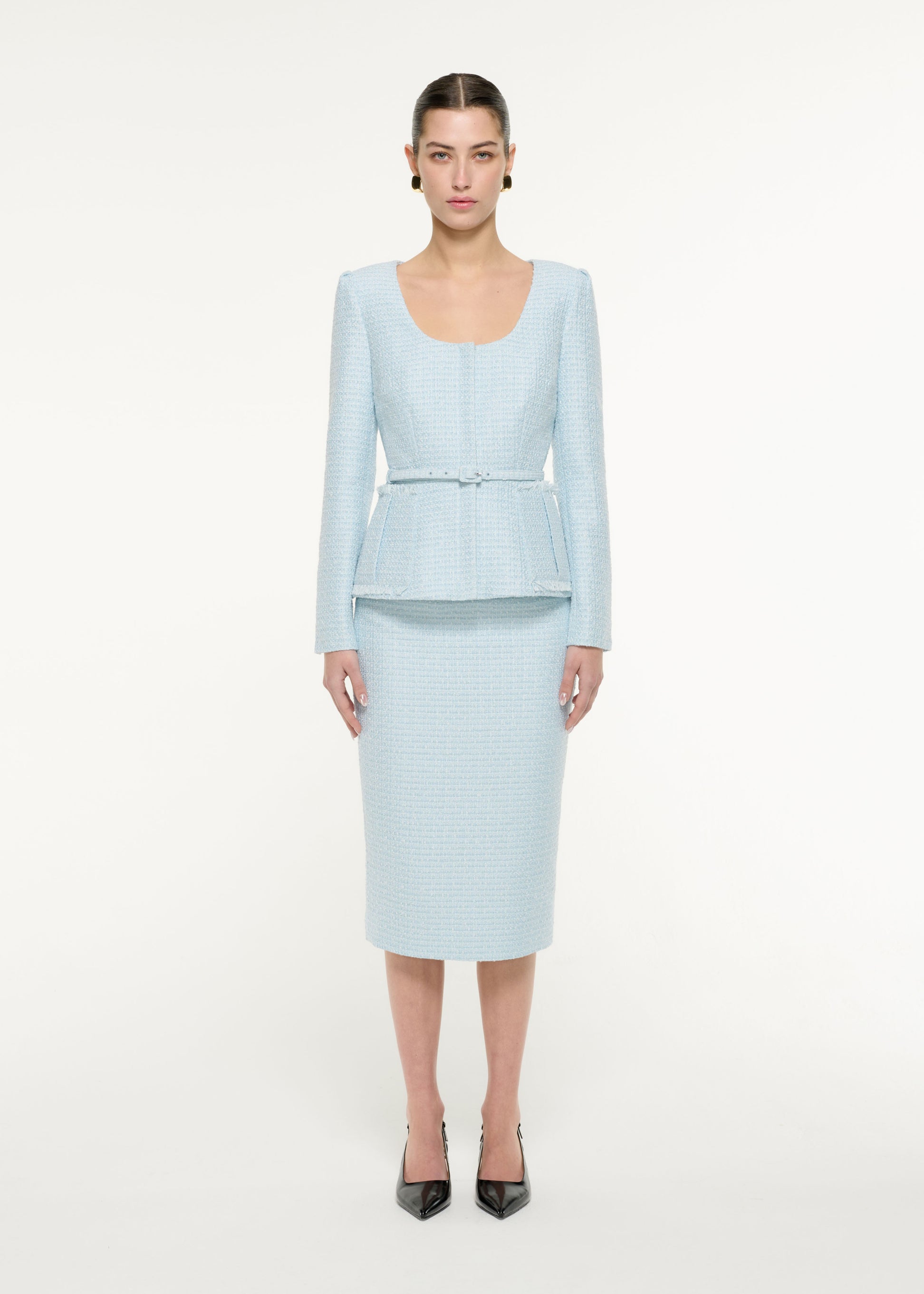 Front view of a model wearing the Boucle Jacket in Blue