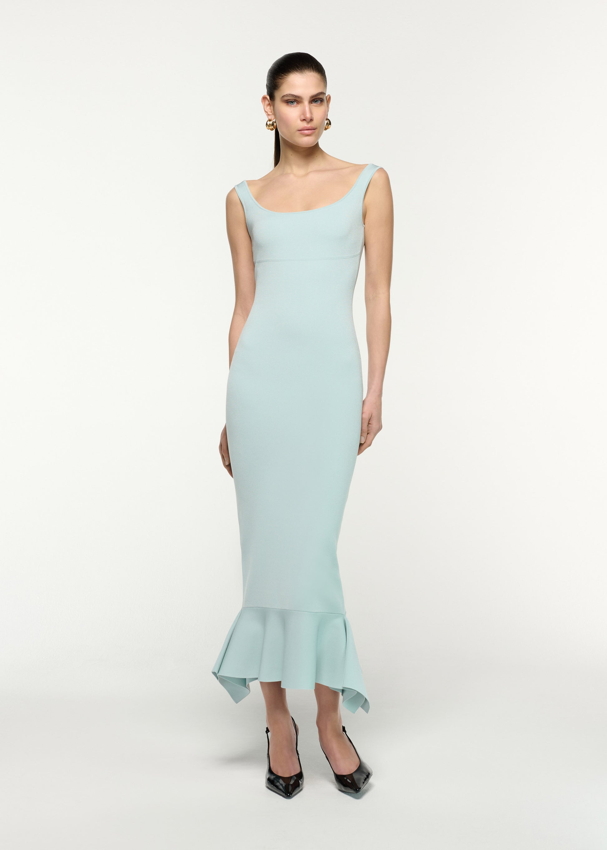 Front view of a model wearing the Fit And Flare Knit Midi Dress in Aqua