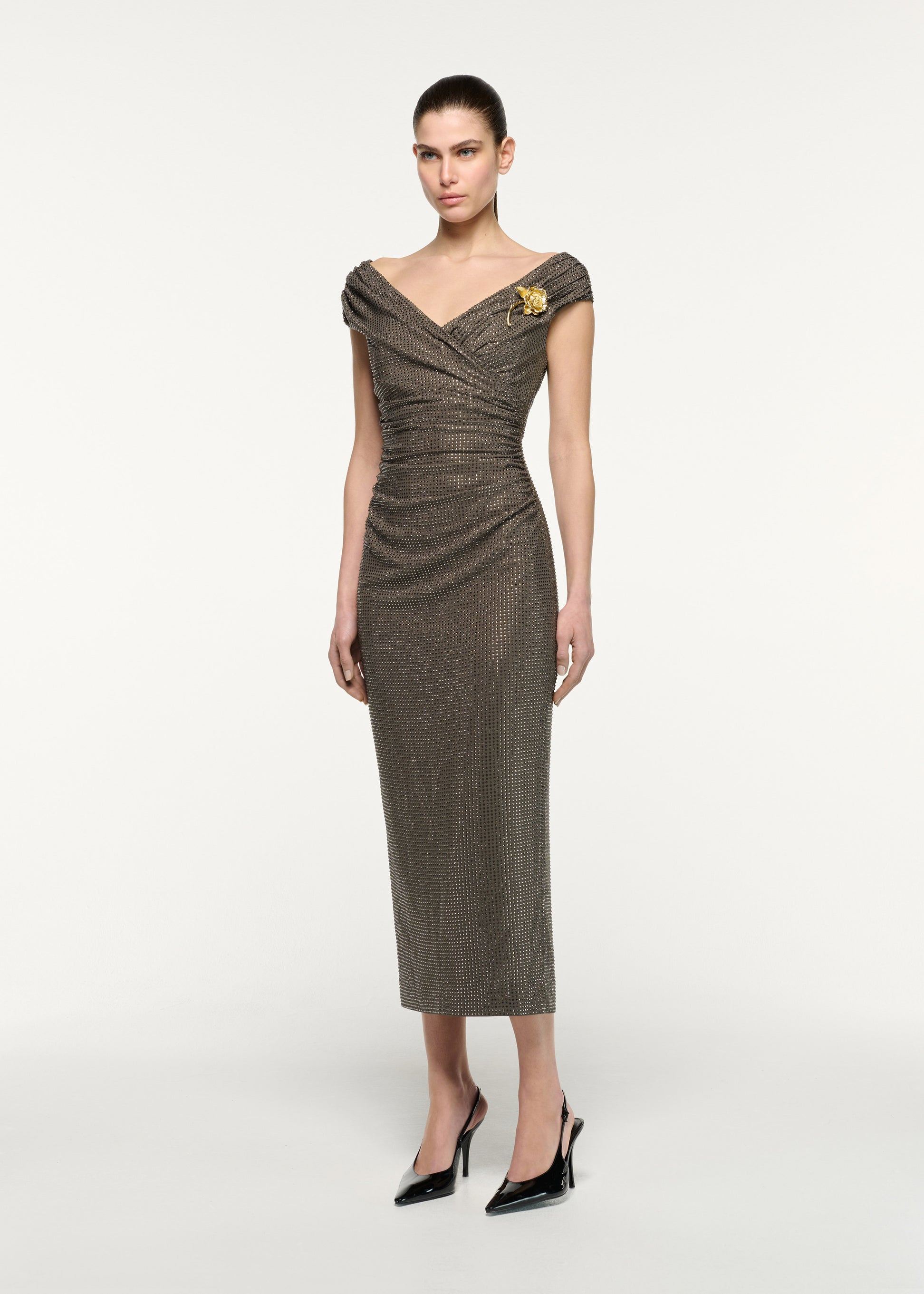 Side view of a model wearing the Gold Rose Brooched Diamante Midi Dress in Taupe