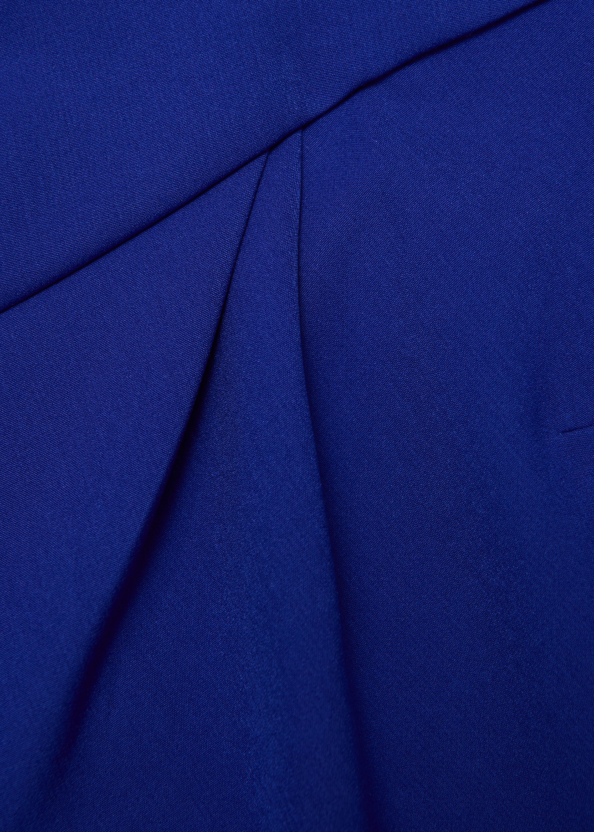 A close up of the fabric for the Asymmetric Twist Drape Midi Dress in Blue