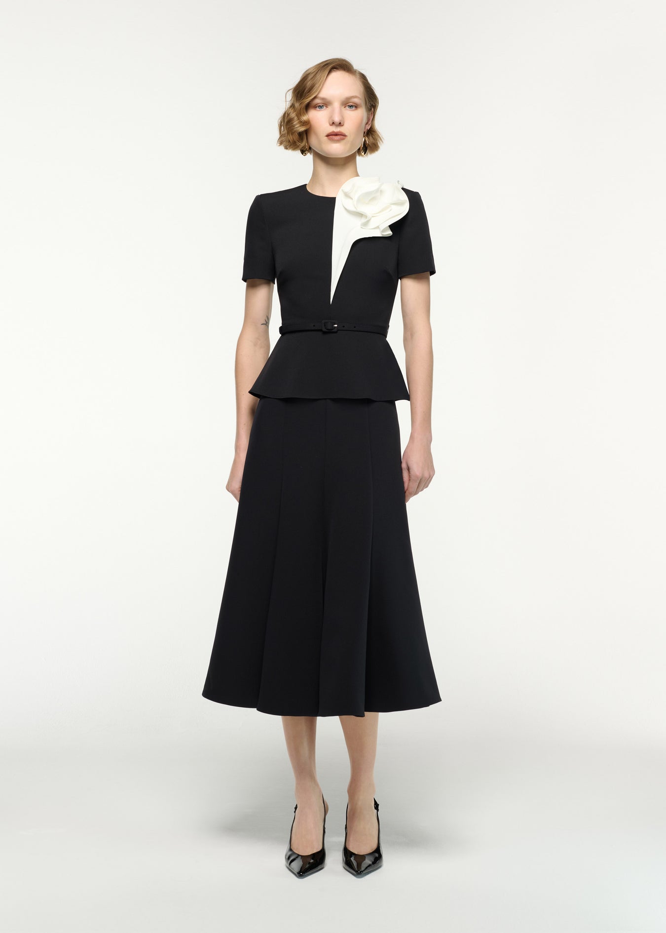 Front view of a model wearing the Flower Belted Midi Dress in Black