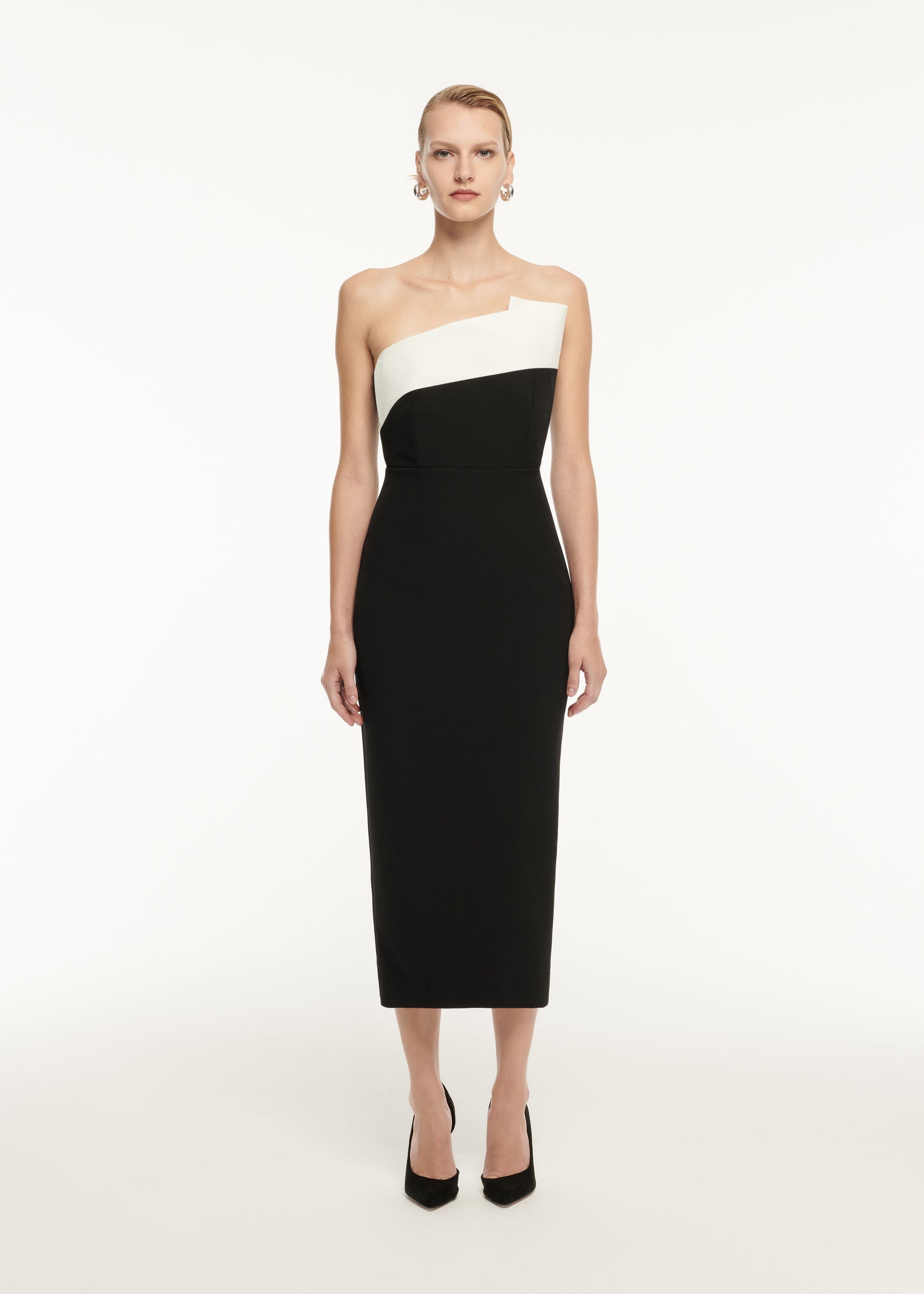 Front view of a model wearing the Strapless Drape Detail Crepe Midi Dress in Monochrome