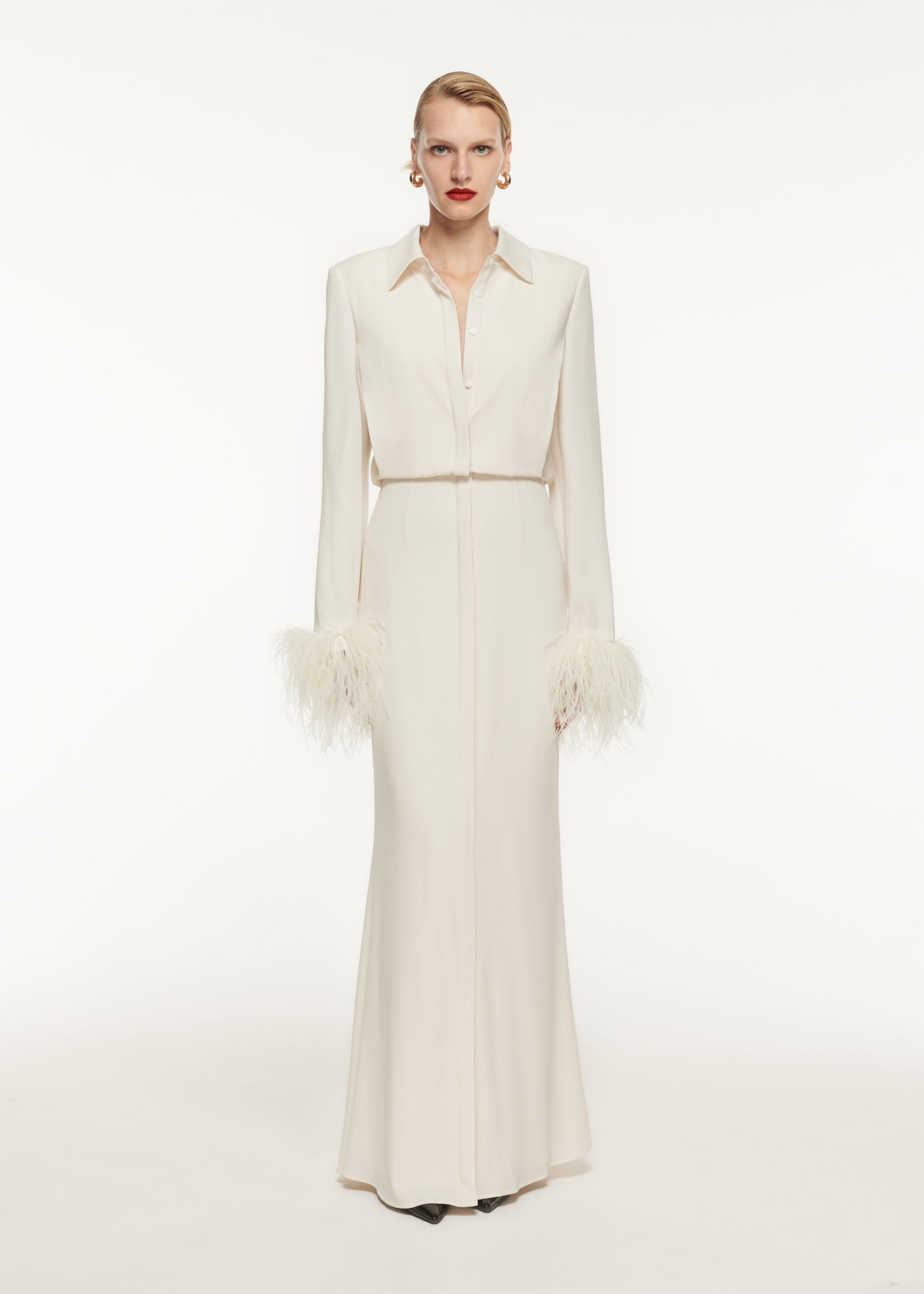 A woman wearing the Long Sleeve Satin Crepe Shirt Maxi Dress in Cream