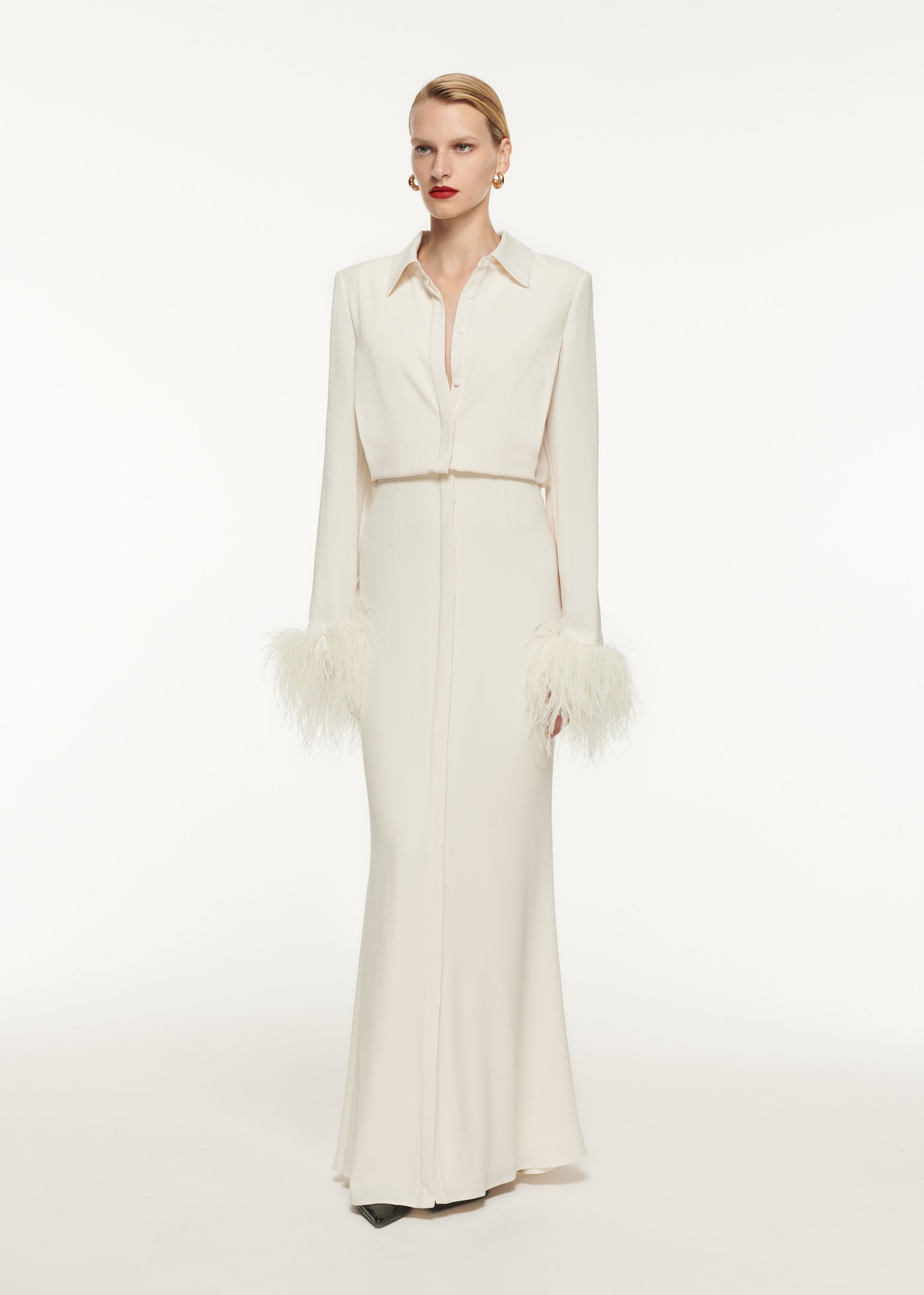 A woman wearing the Long Sleeve Satin Crepe Shirt Maxi Dress in Cream