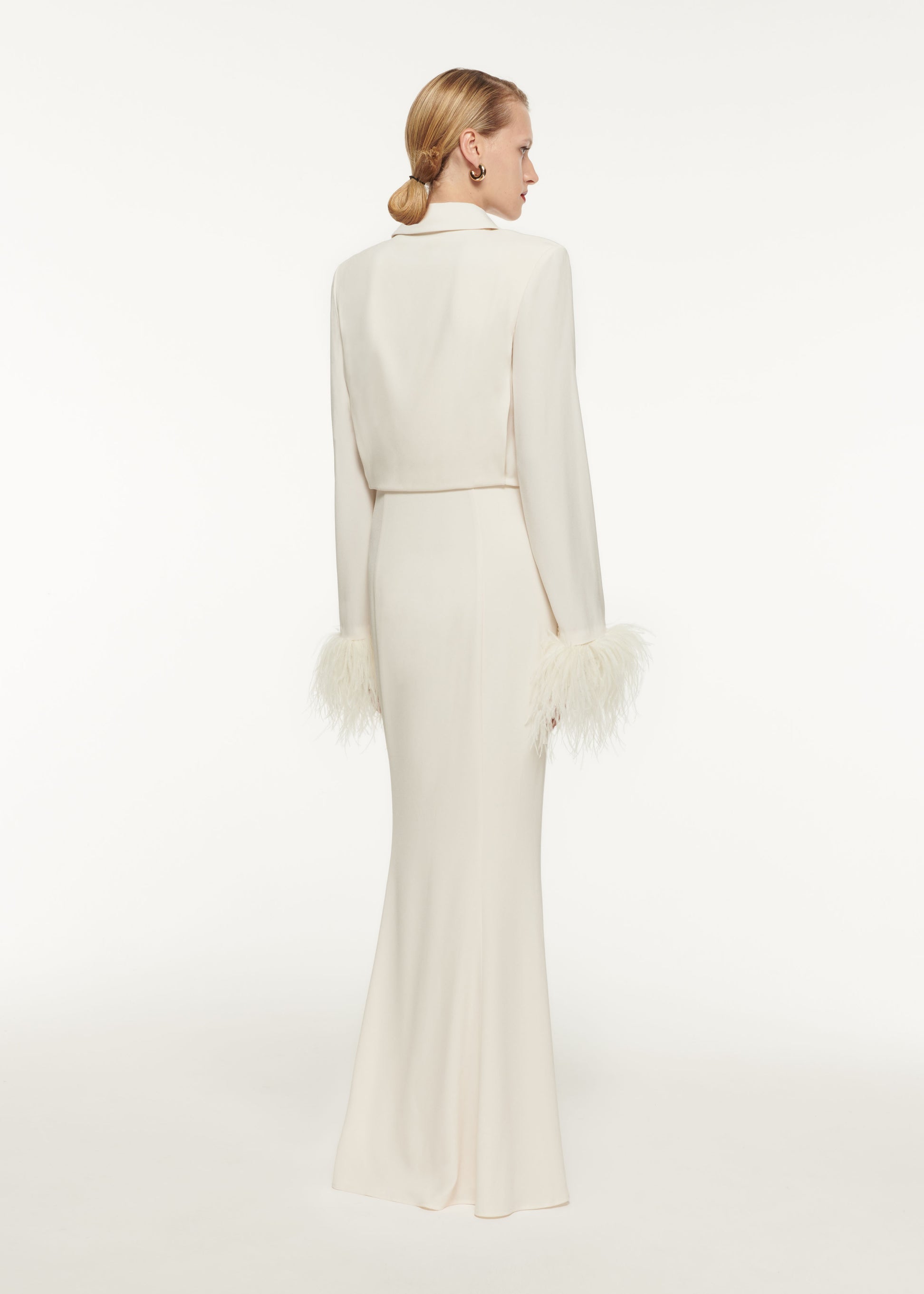 The back of a woman wearing the Stretch Cady Midi Dress