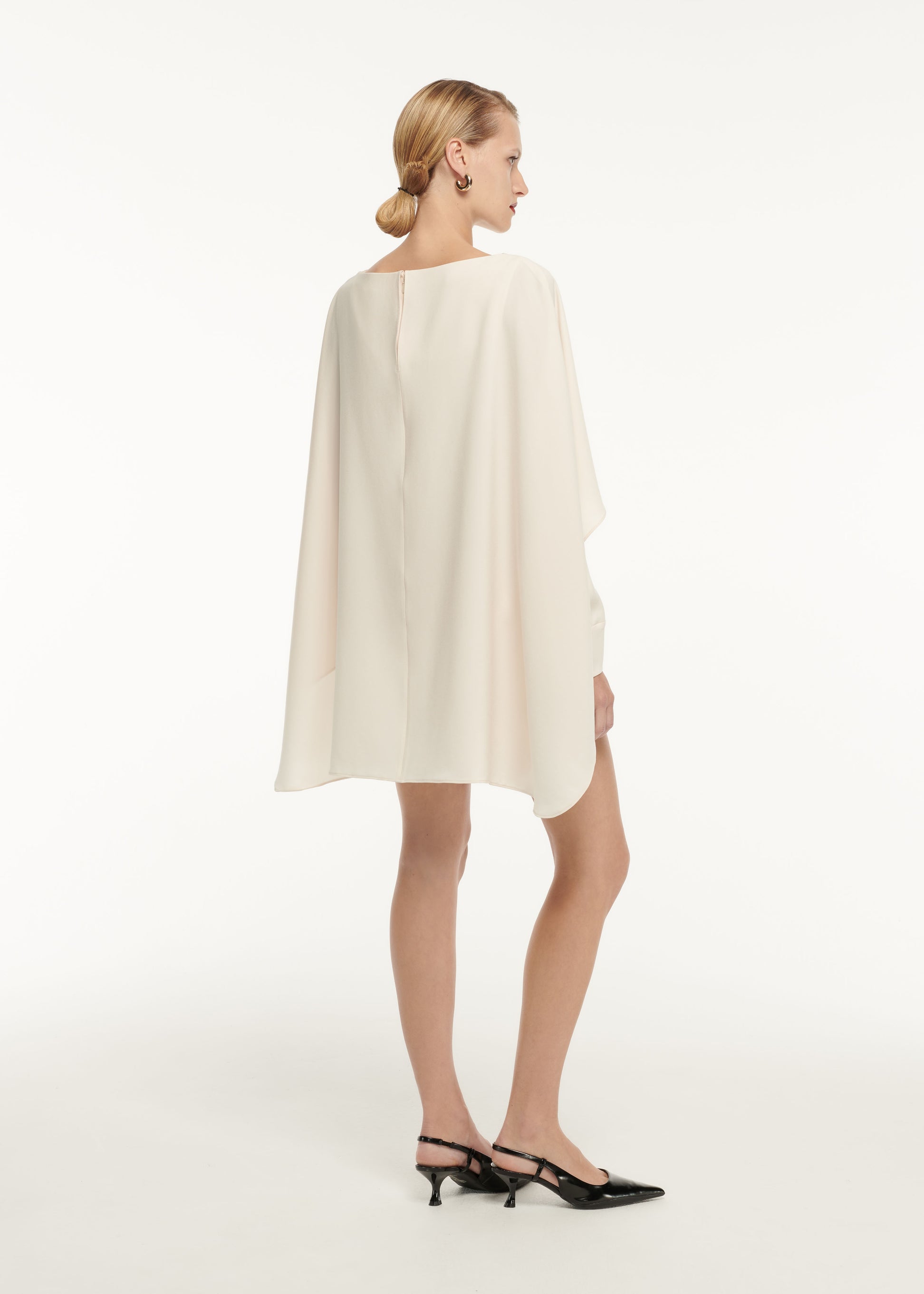 The back of a woman wearing the Stretch Cady Midi Dress Navy