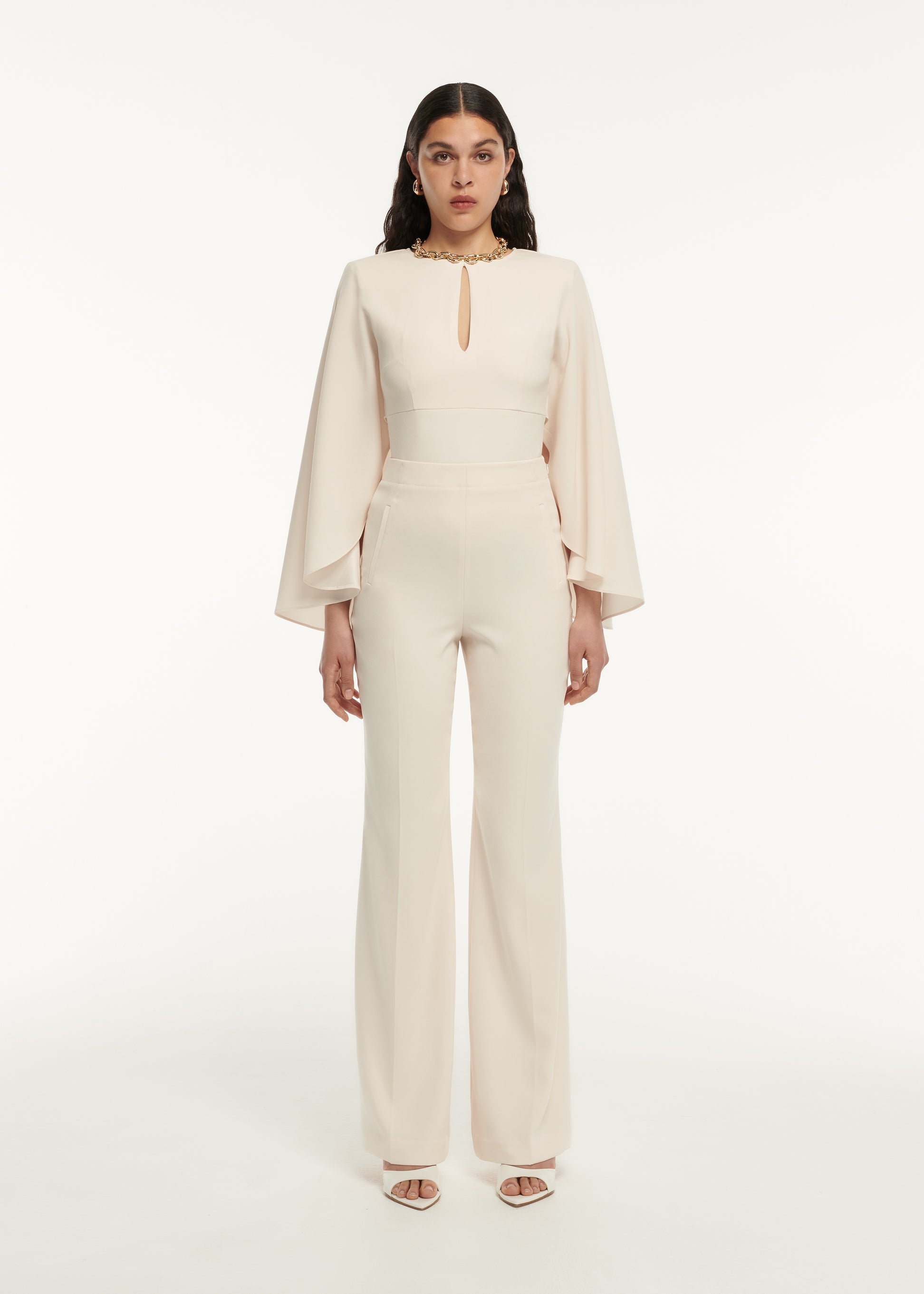 A woman wearing the Long Sleeve Satin Crepe Top