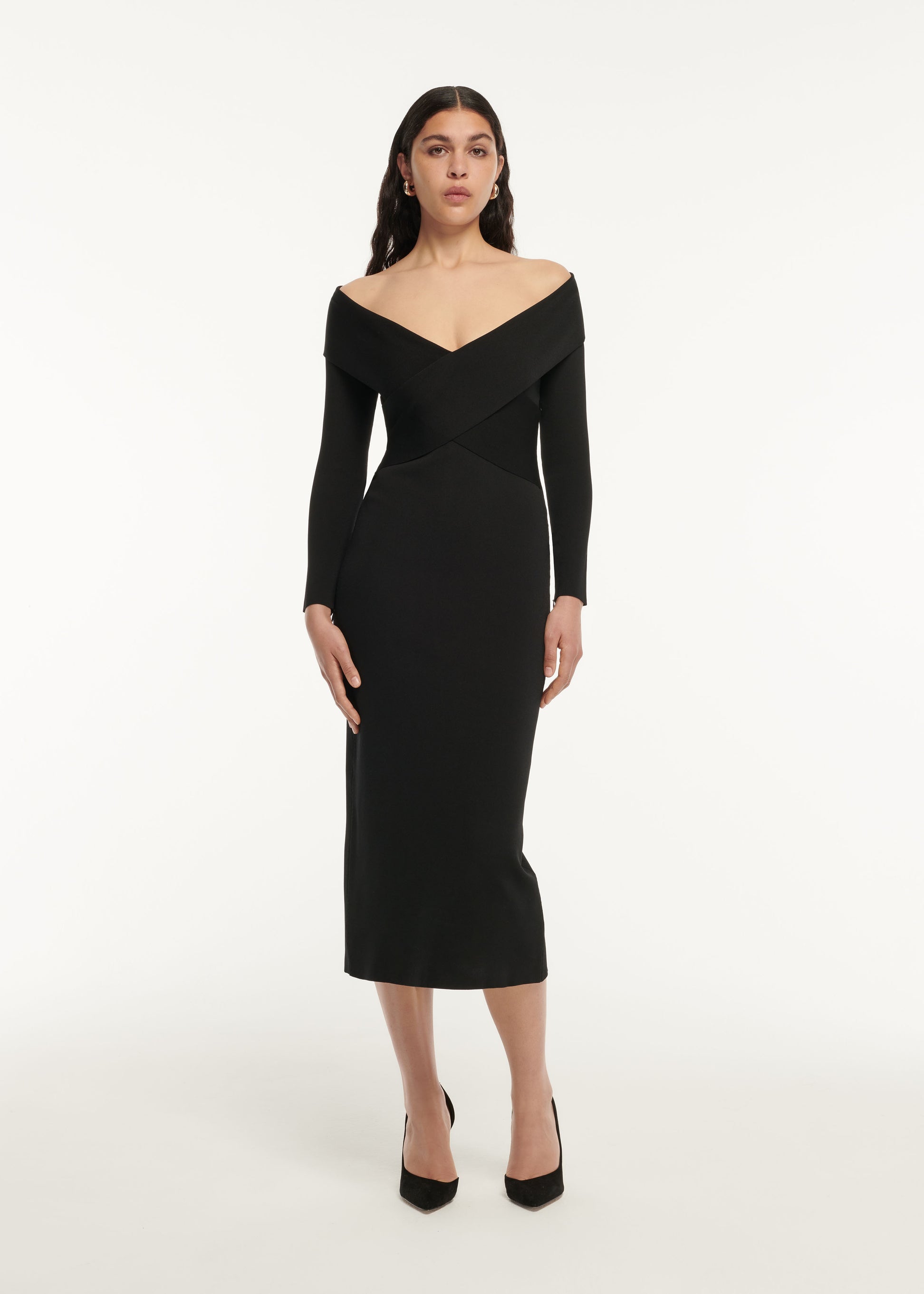 A woman wearing the Long Sleeve Flat Knit Midi Dress in Black