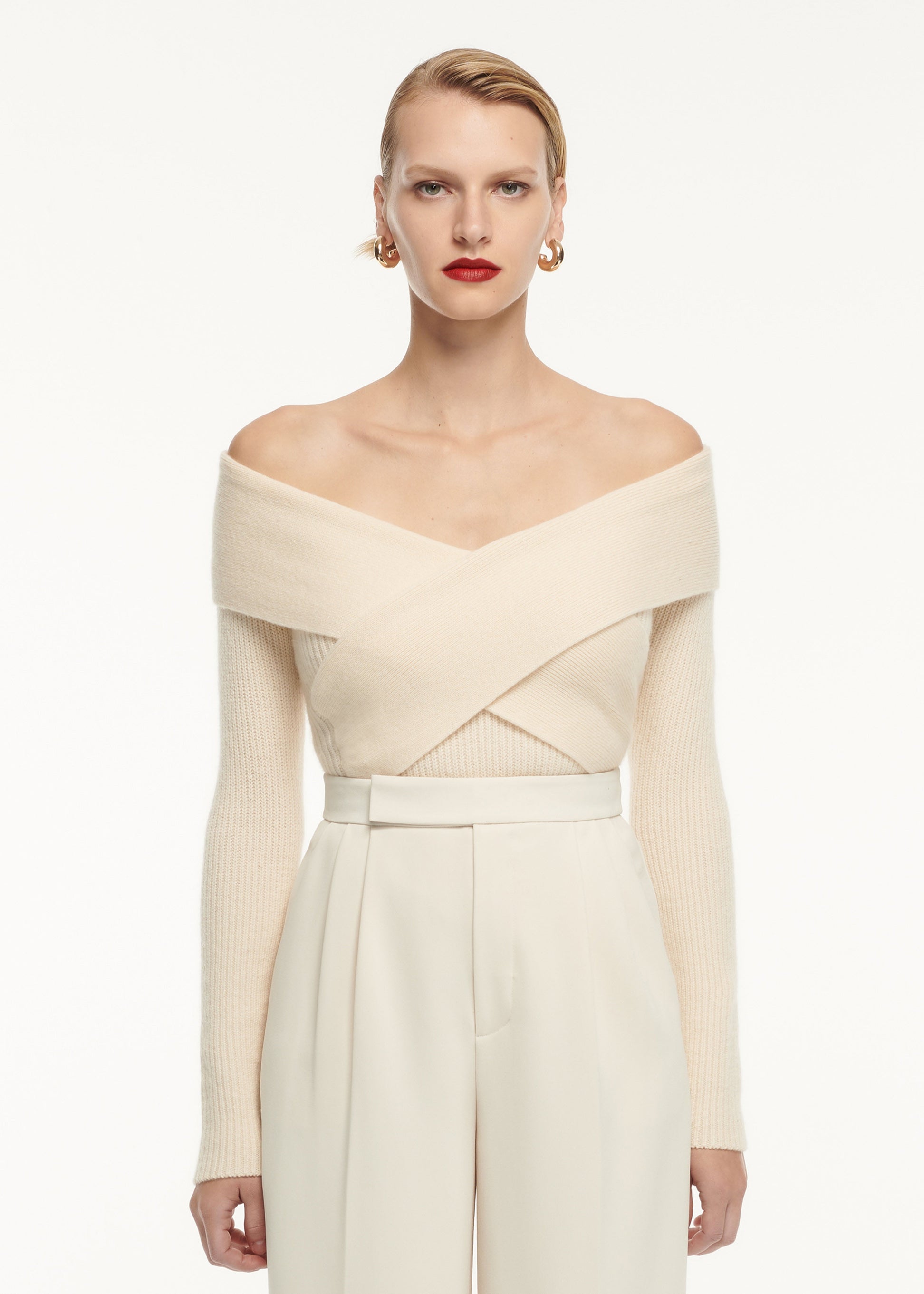 A close up of a woman wearing the Long Sleeve Cashmere Top