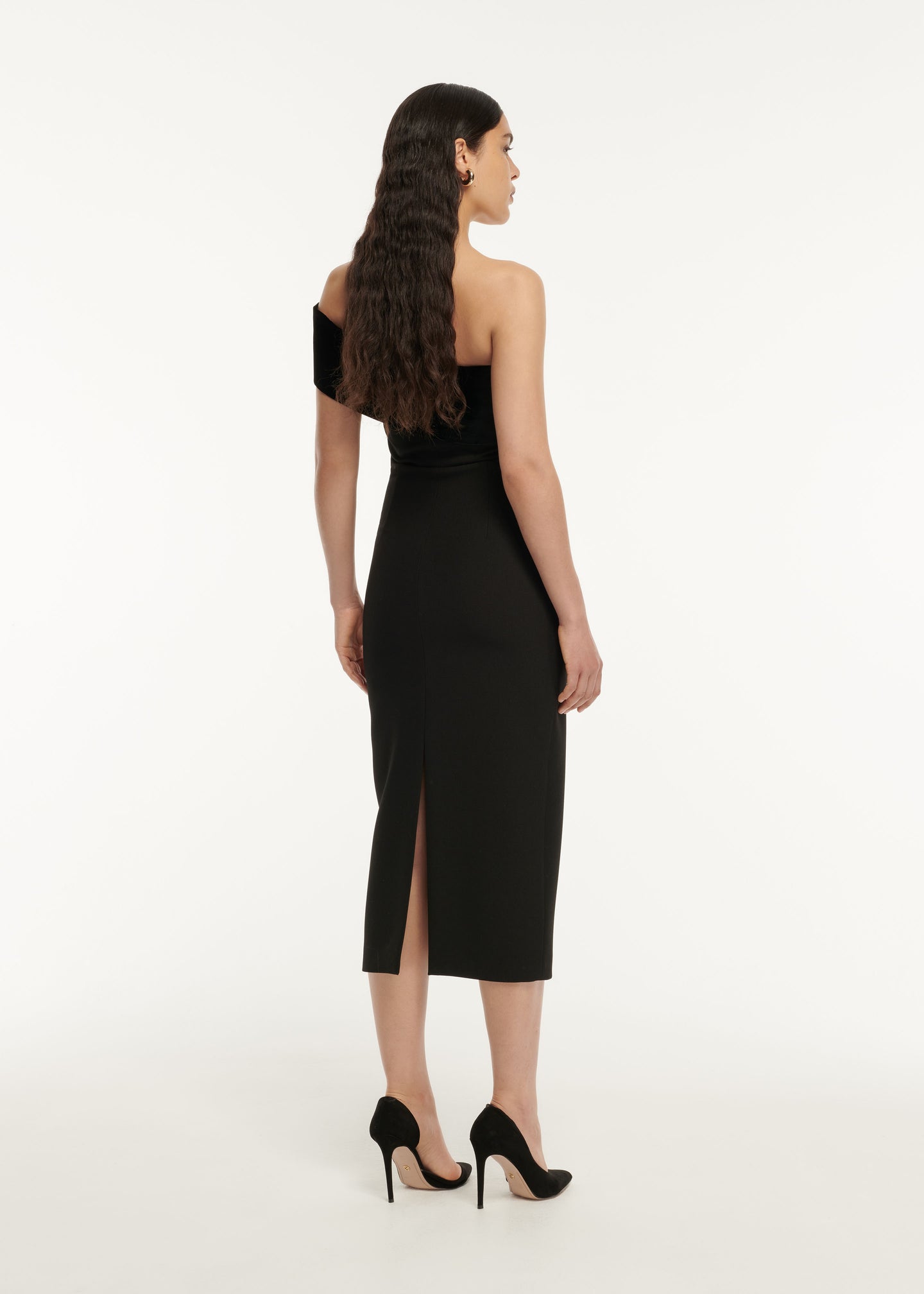 The back of a woman wearing the Sequin Midi Dress Maroon