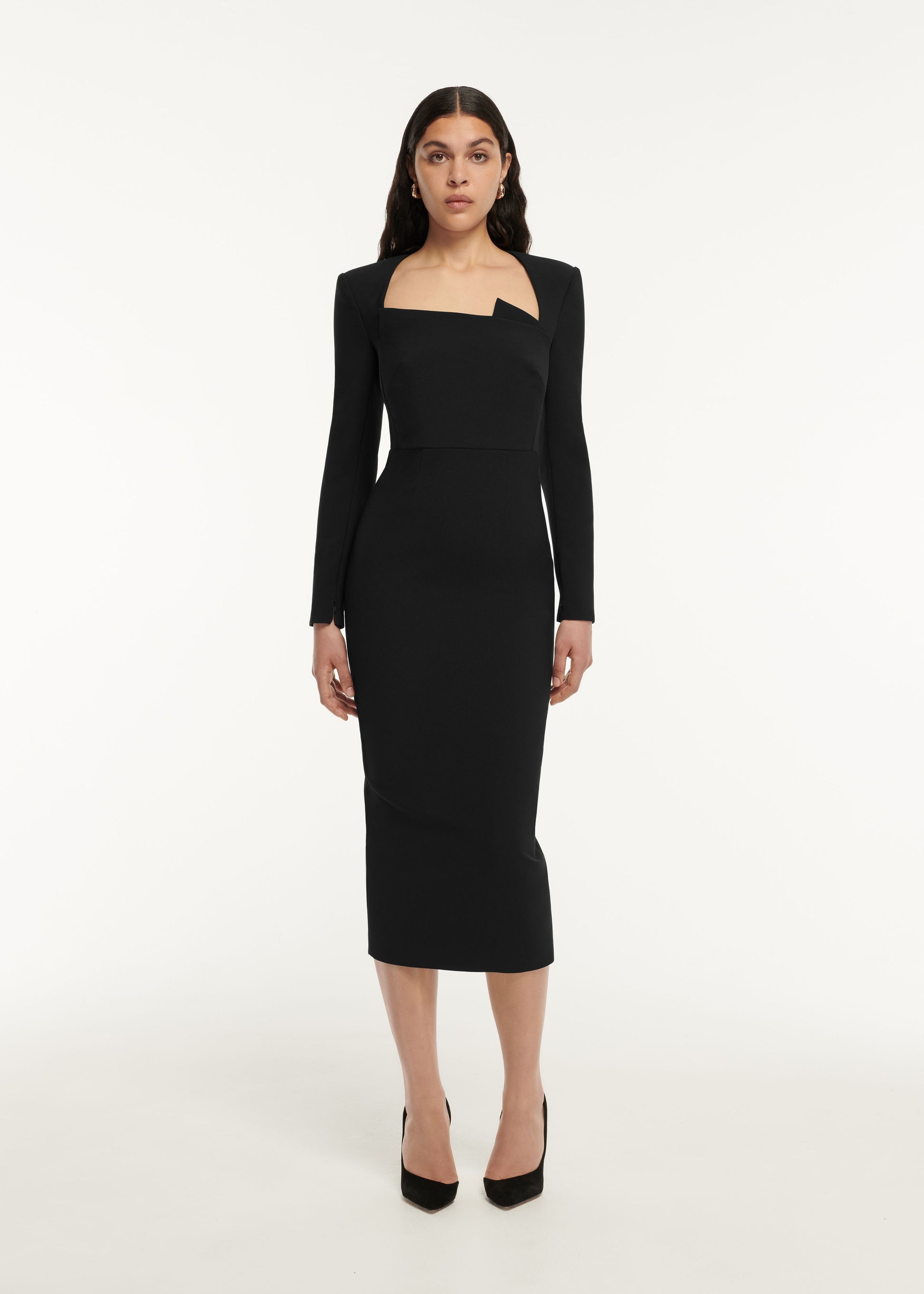 A woman wearing the Long Sleeve Crepe Midi Dress in Black