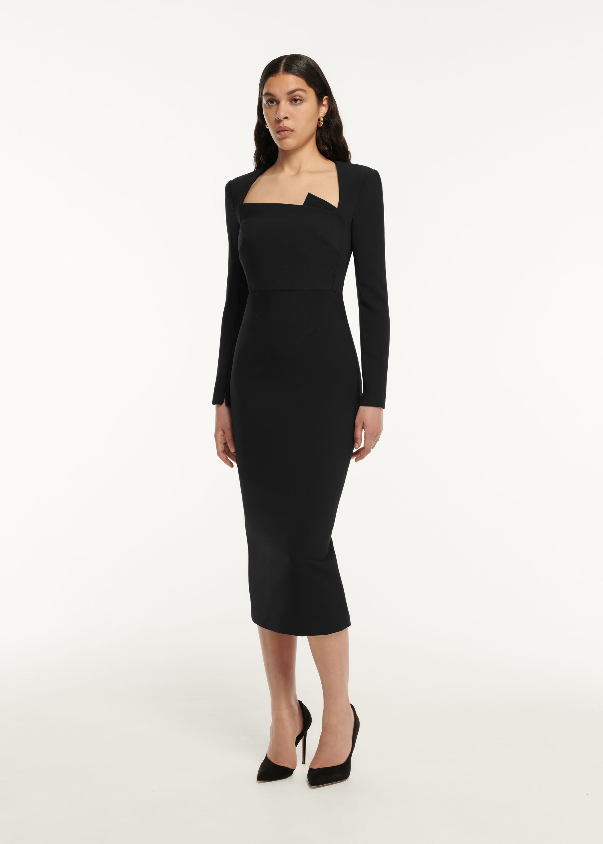 A woman wearing the Long Sleeve Crepe Midi Dress in Black