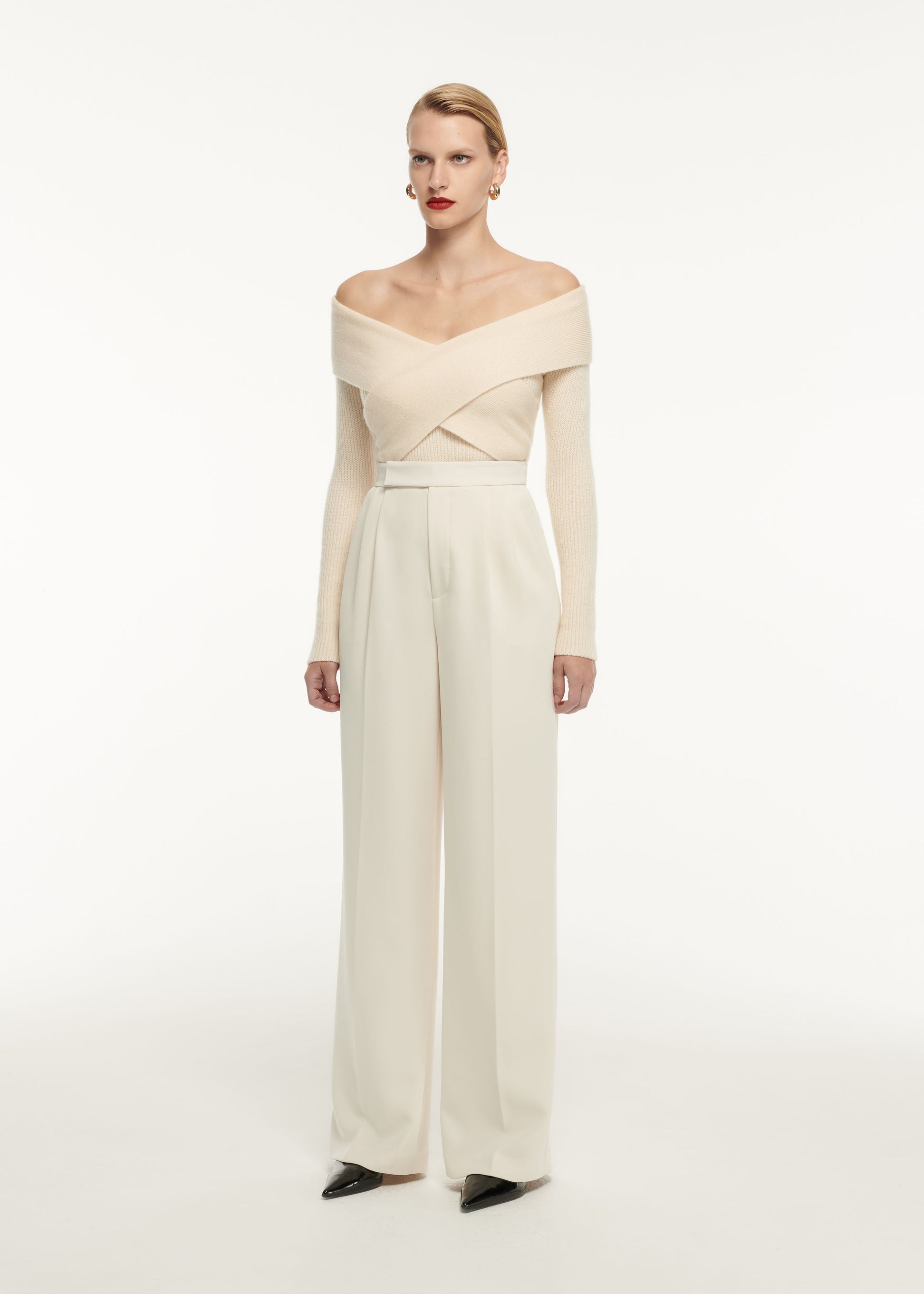 A woman wearing the Wide Leg Stretch Cady Trouser in Cream